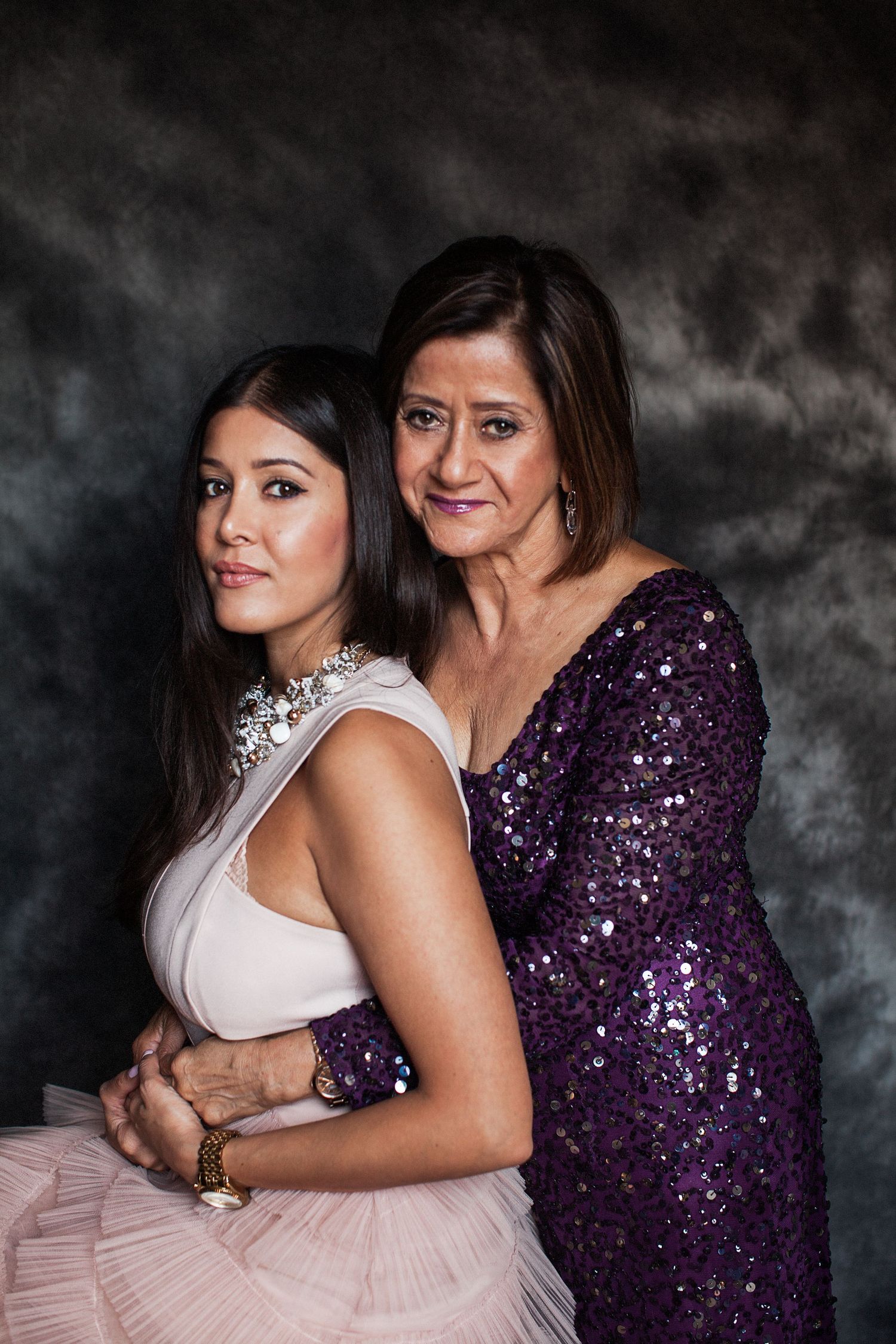 Mother and daughter studio portrait.