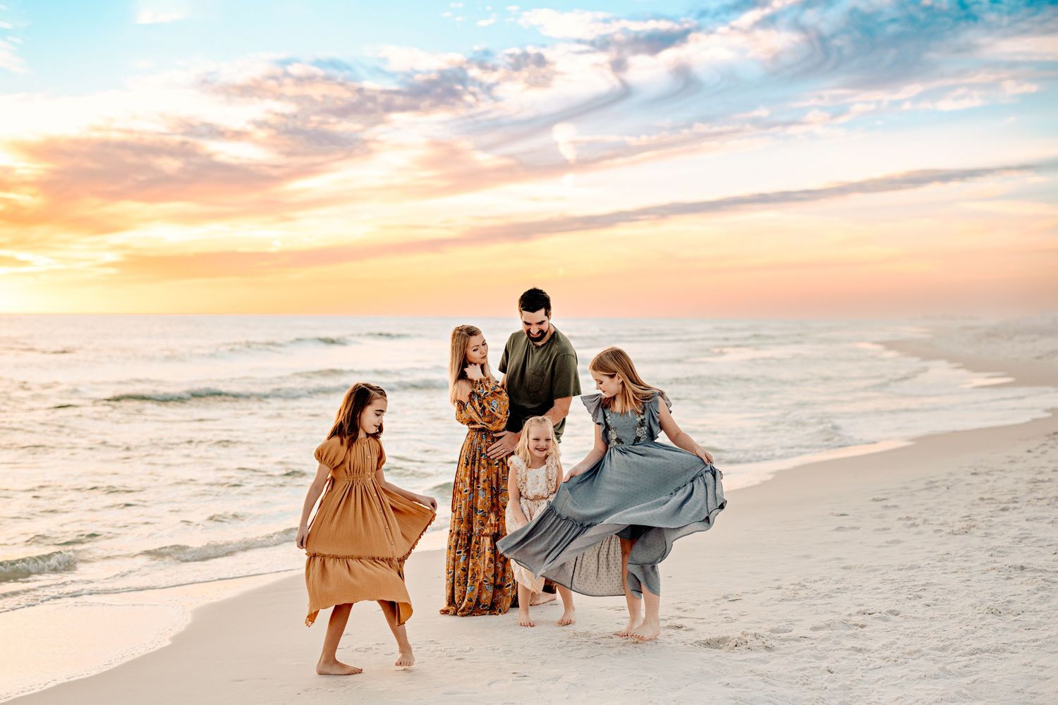Parents sharing a warm hug while their daughters twirl joyfully in front of them, creating a loving family scene.