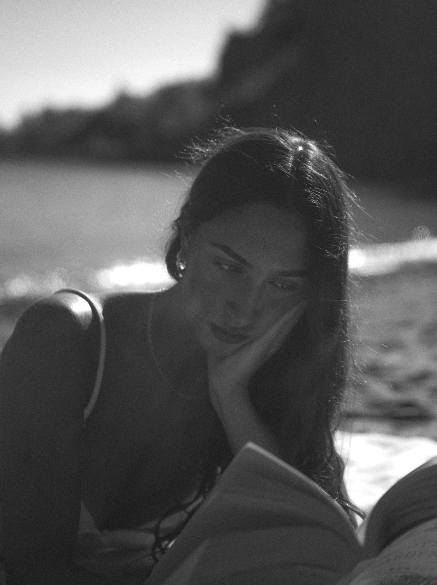 Portrait photography of girl reading on beach, Toronto