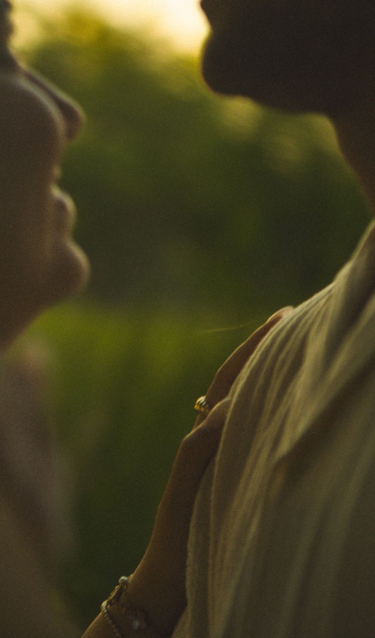 Cinematic documentary-style couples photography taken in Toronto nature, candid and emotional interaction, beach