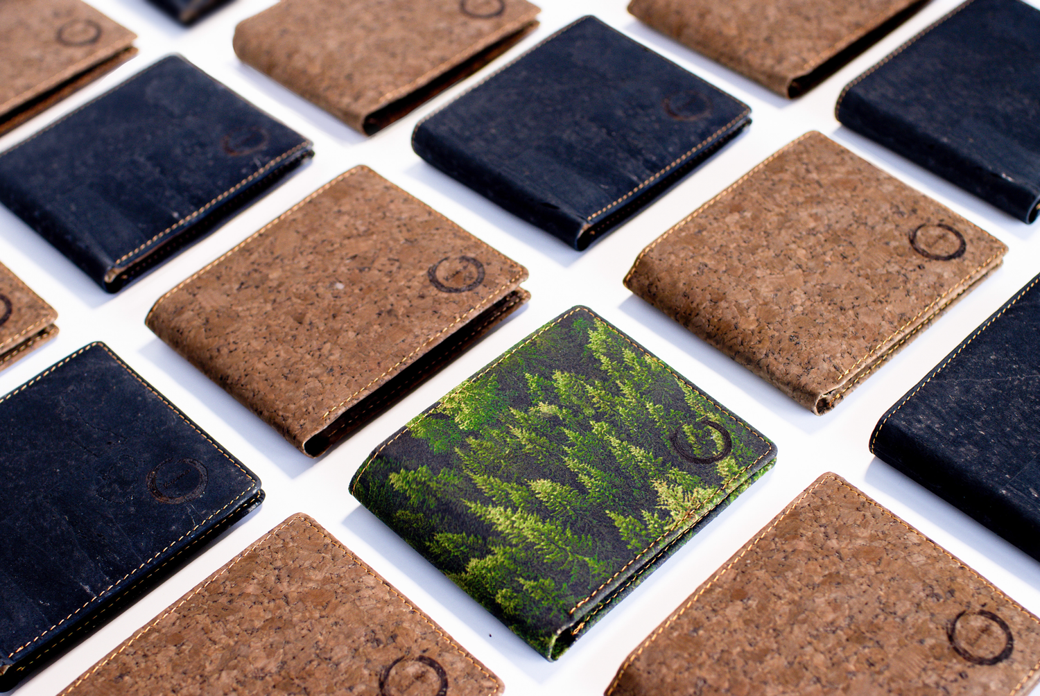Product photography created for KUMA, a Toronto-based leather goods brand known for sustainably made wallets and card holders.