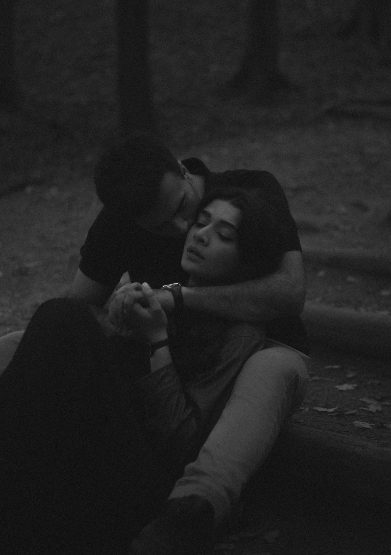 Cinematic documentary-style couples photography taken outdoors in Ontario, candid and emotional interaction