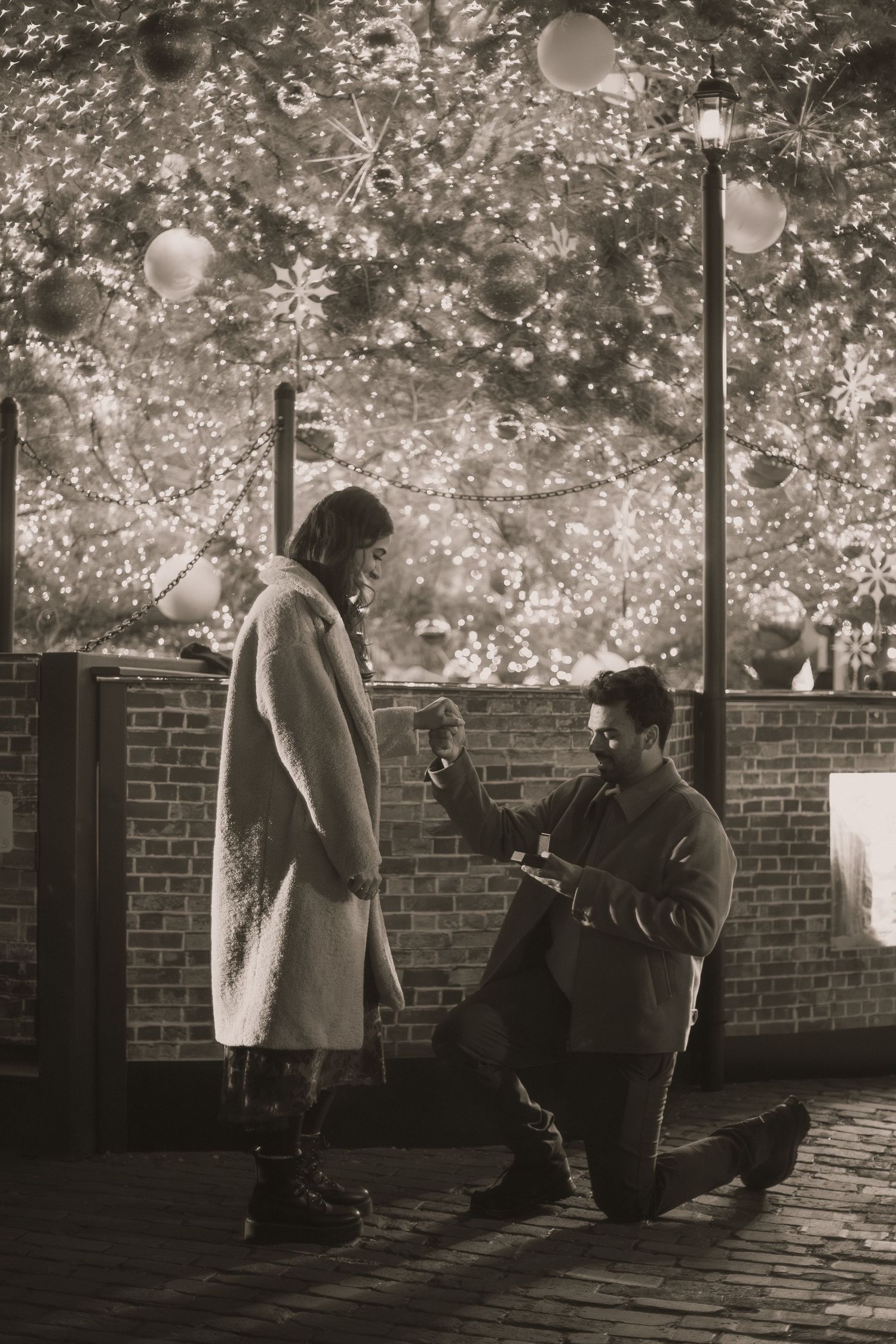 Proposal moment of couple in Christmas Market, Toronto