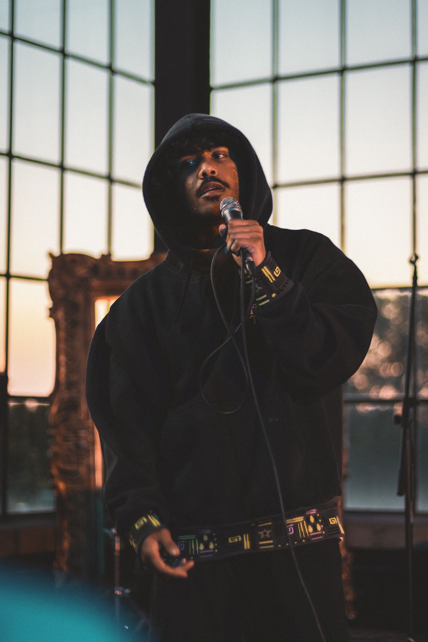 Candid musical event photography, rapper performing