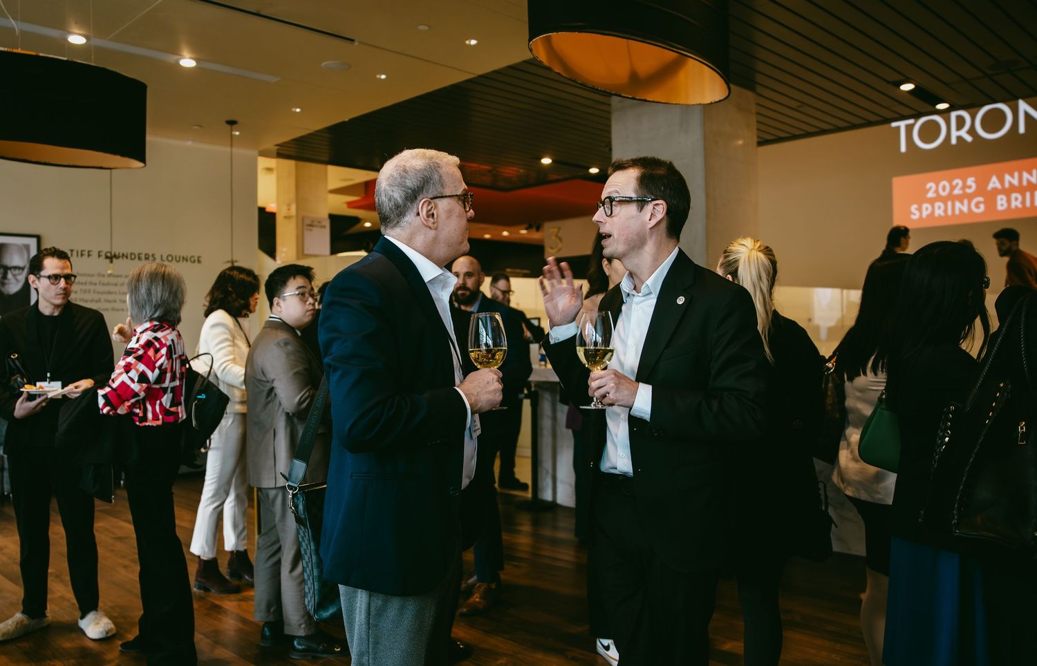 Corporate networking event, a candid photo in downtown toronto venue