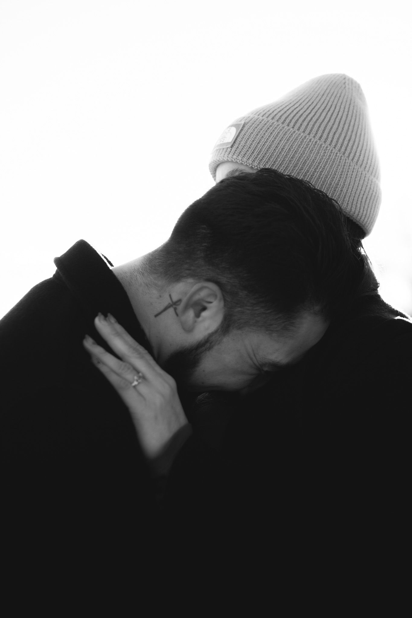 Cinematic documentary-style couples photography taken outdoors in Ontario, candid and emotional interaction
