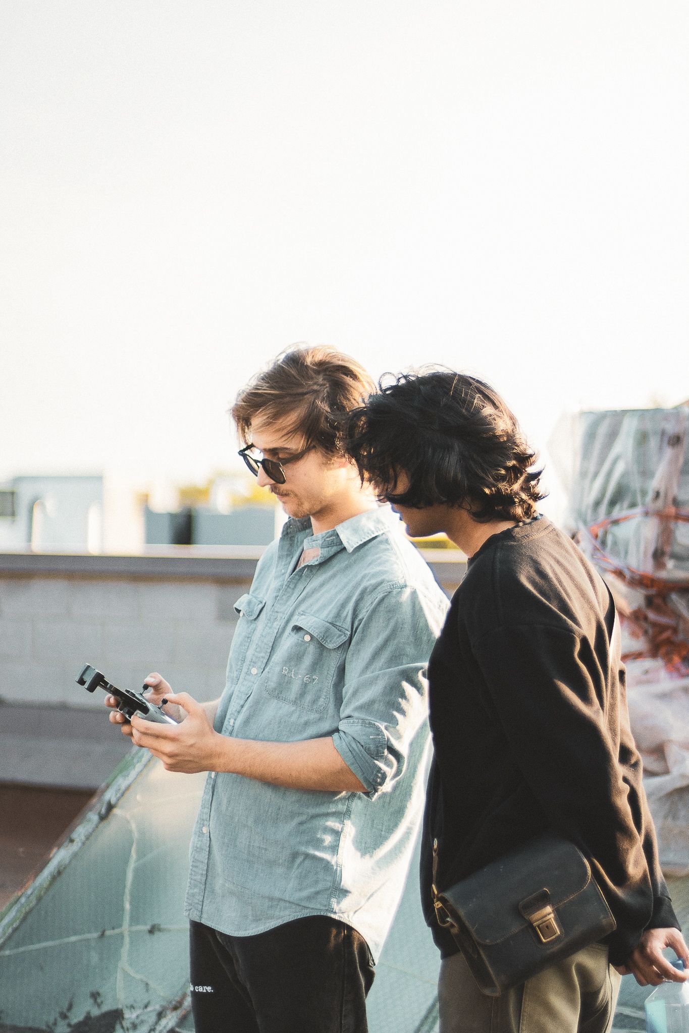 Candid rooftop photography, drone operator