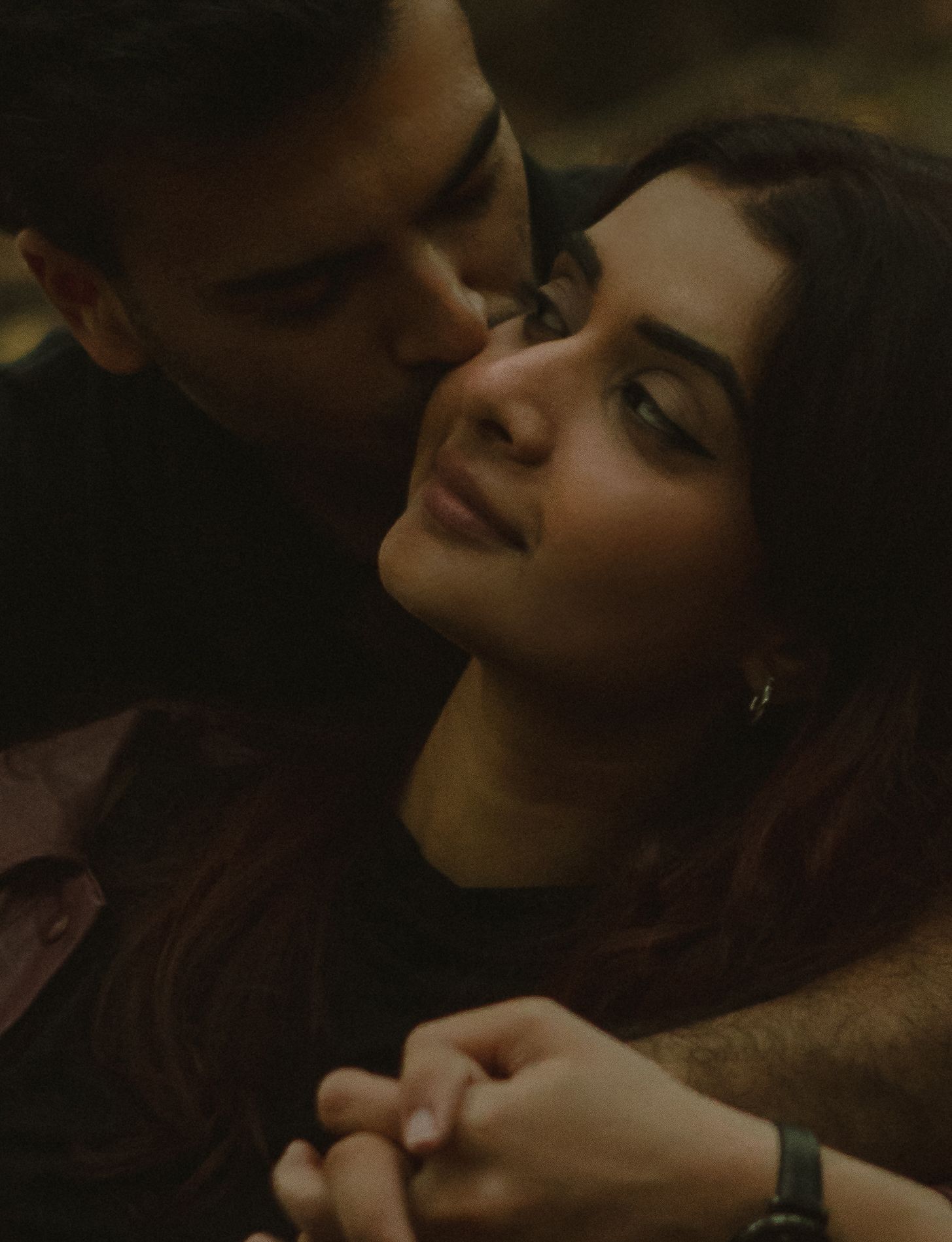 Cinematic documentary-style couples photography taken outdoors in Ontario, candid and emotional interaction