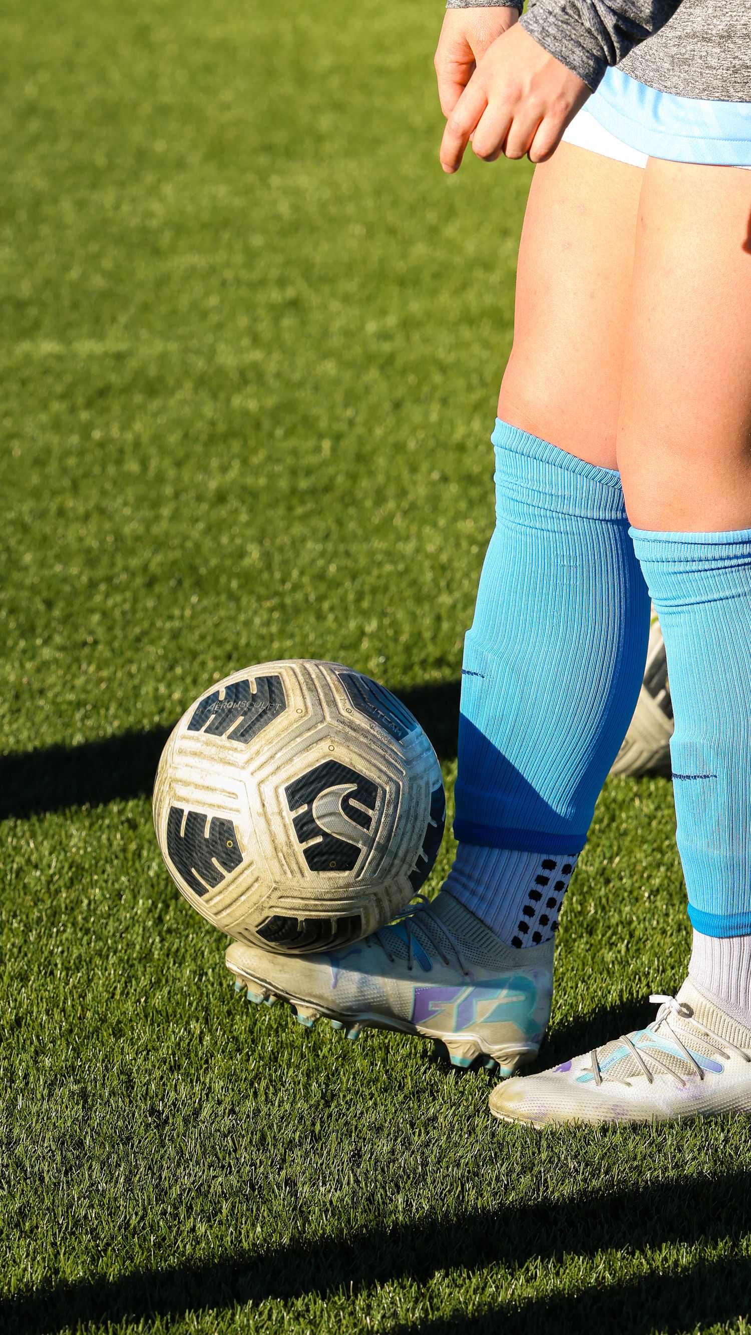 CCU Cougars Player Balances the Ball on Her Cleat