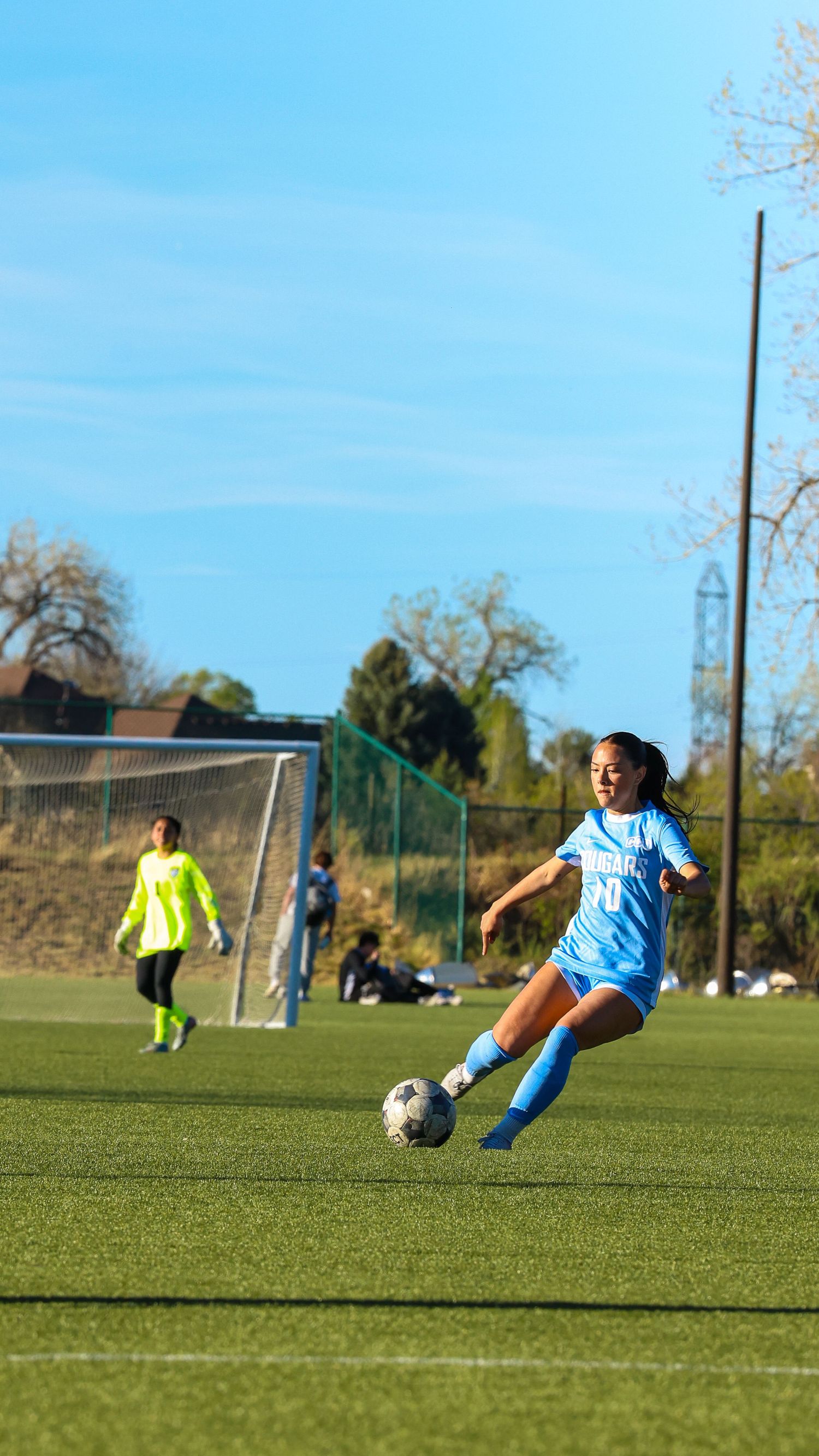 CCU Cougars #10 Strikes the Ball Downfield
