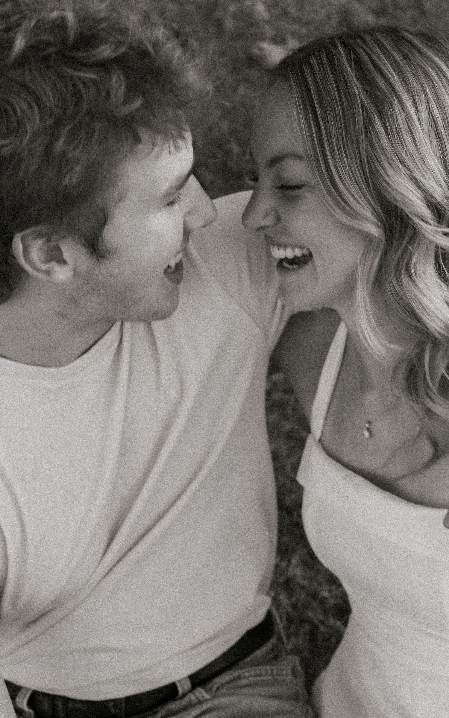 Joyful Black and White Engagement Portrait in Evergreen, Colorado