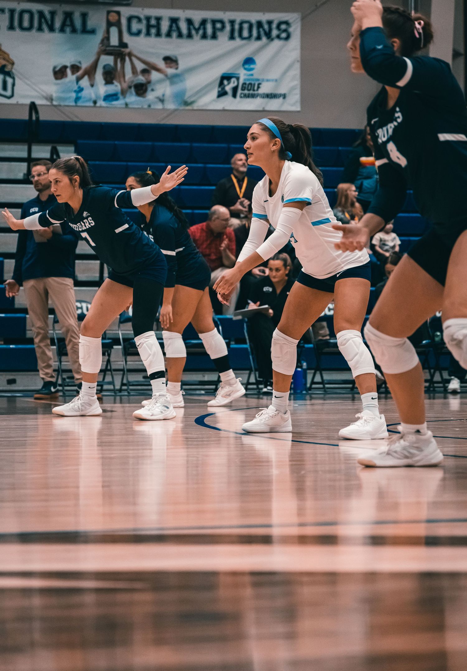 CCU Cougars Defense Set Beneath the Championship Banner