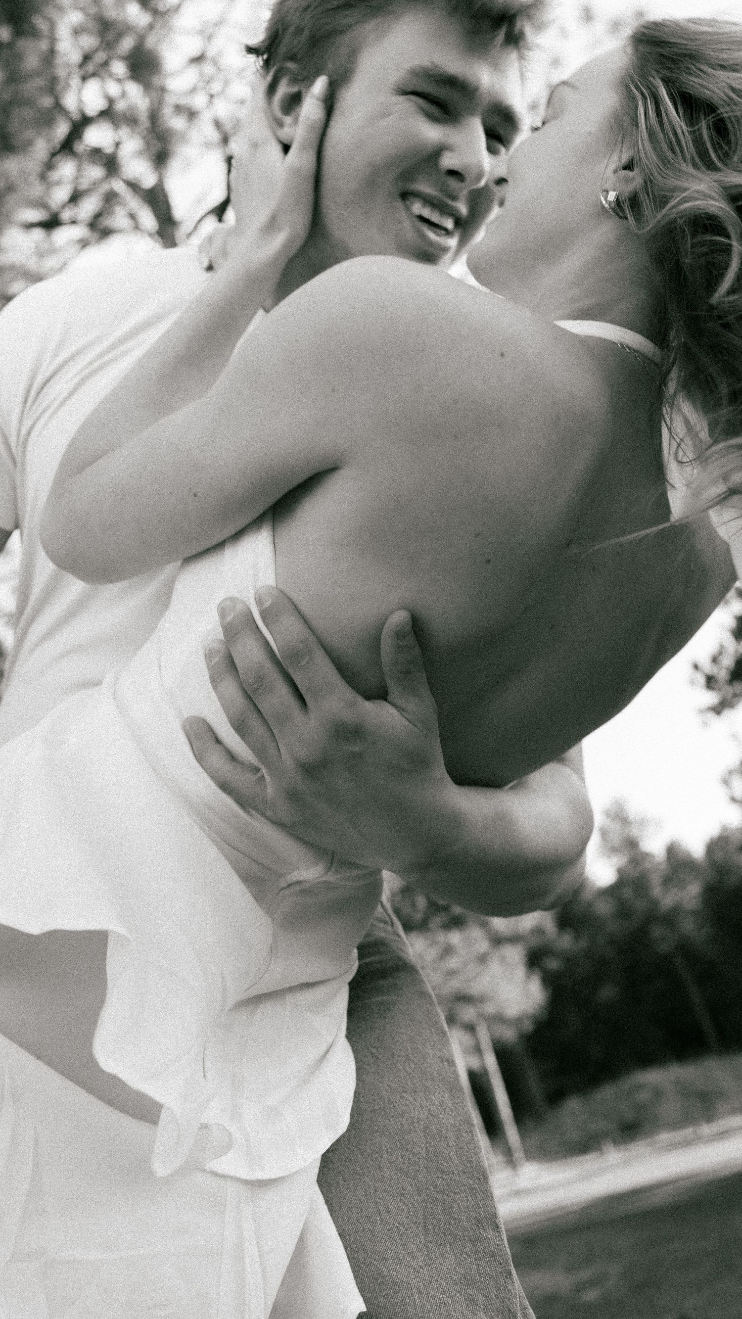 Intimate Black and White Engagement Embrace in Evergreen, Colorado