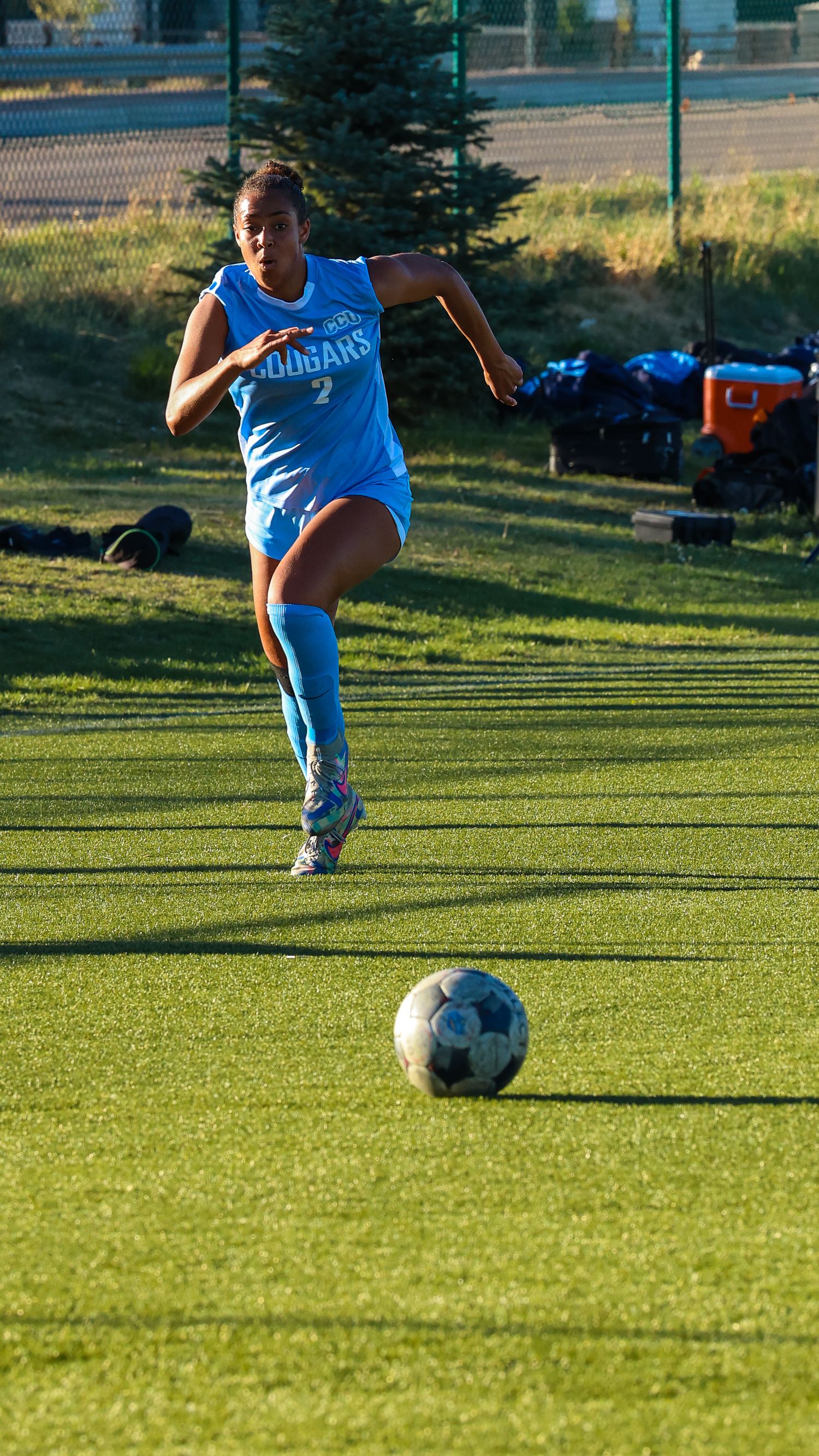 CCU Cougars #2 Sprints to Reach the Ball