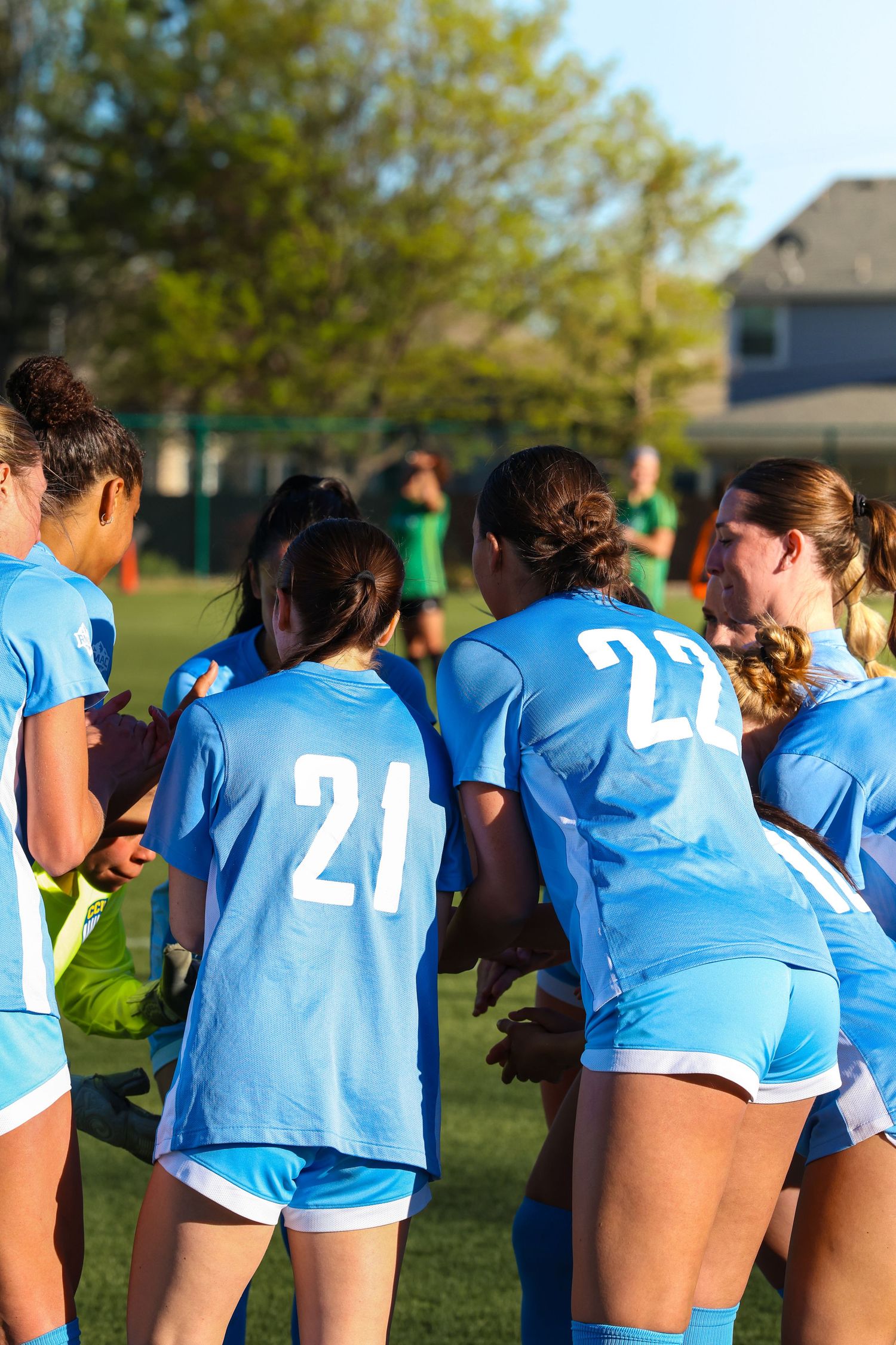 CCU Cougars #21 and #22 in Pre-Match Huddle