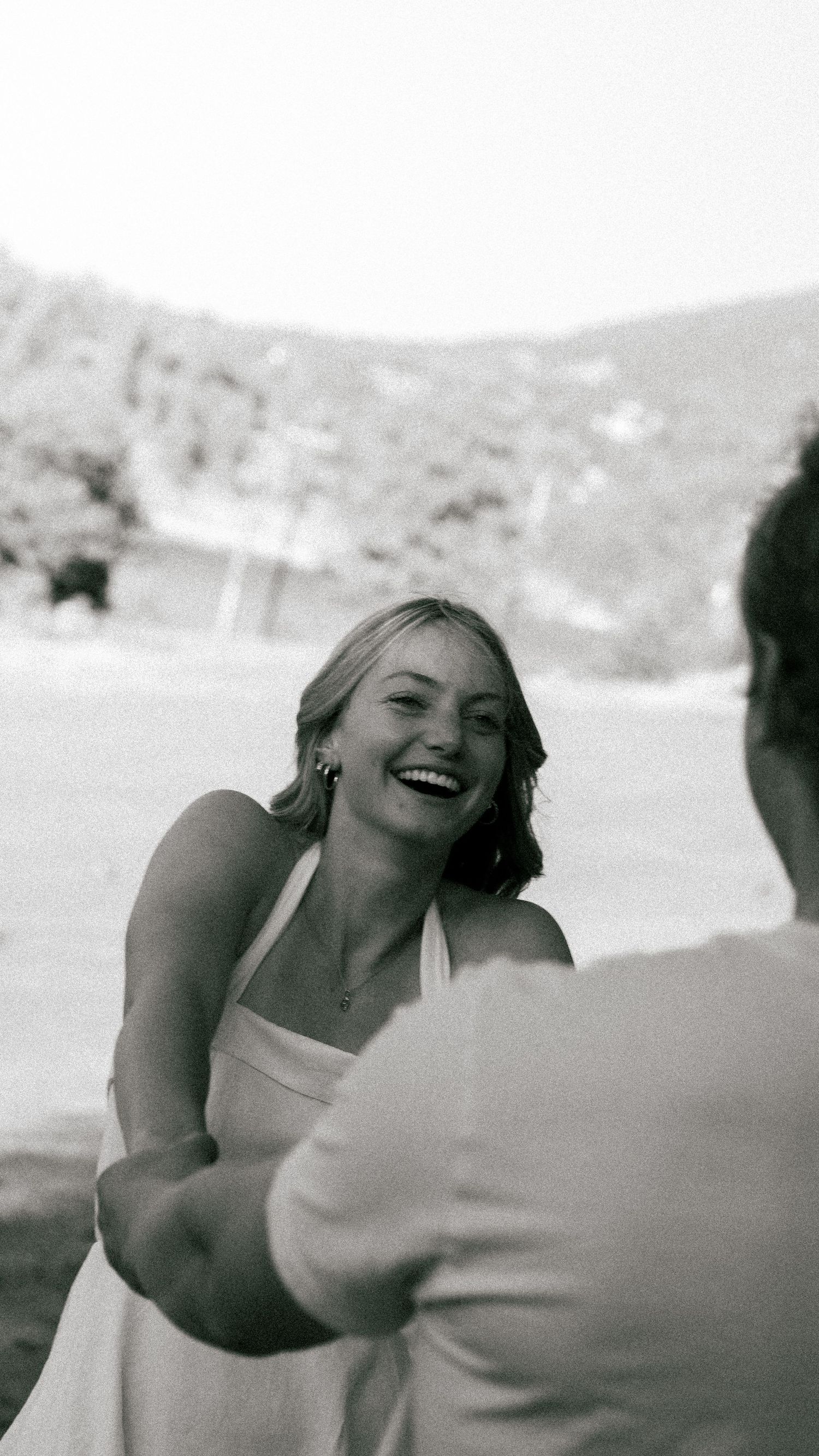 Candid Laughter Captured at Evergreen, Colorado Engagement Shoot