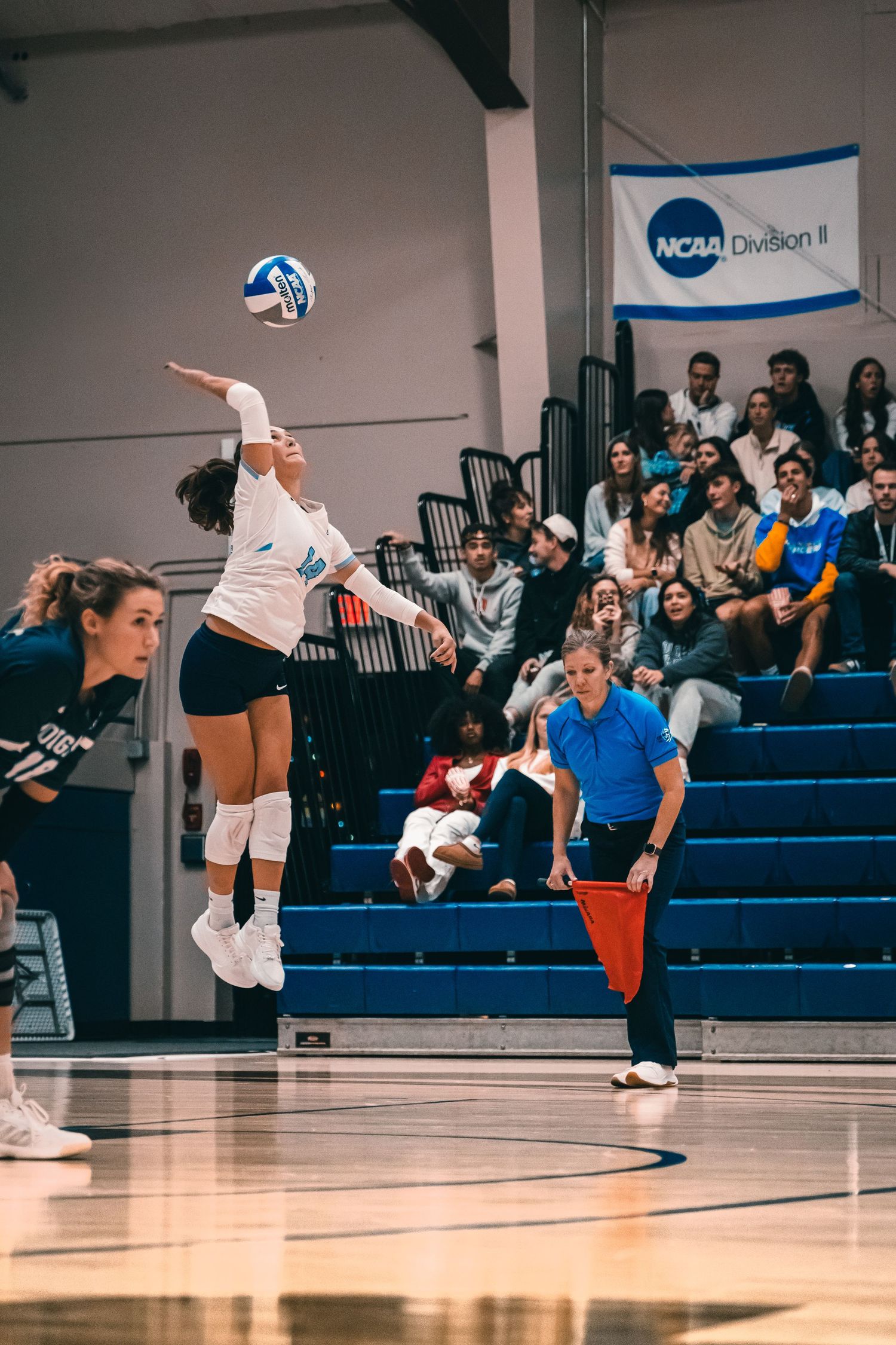CCU Cougars Player Executes a Jump Serve
