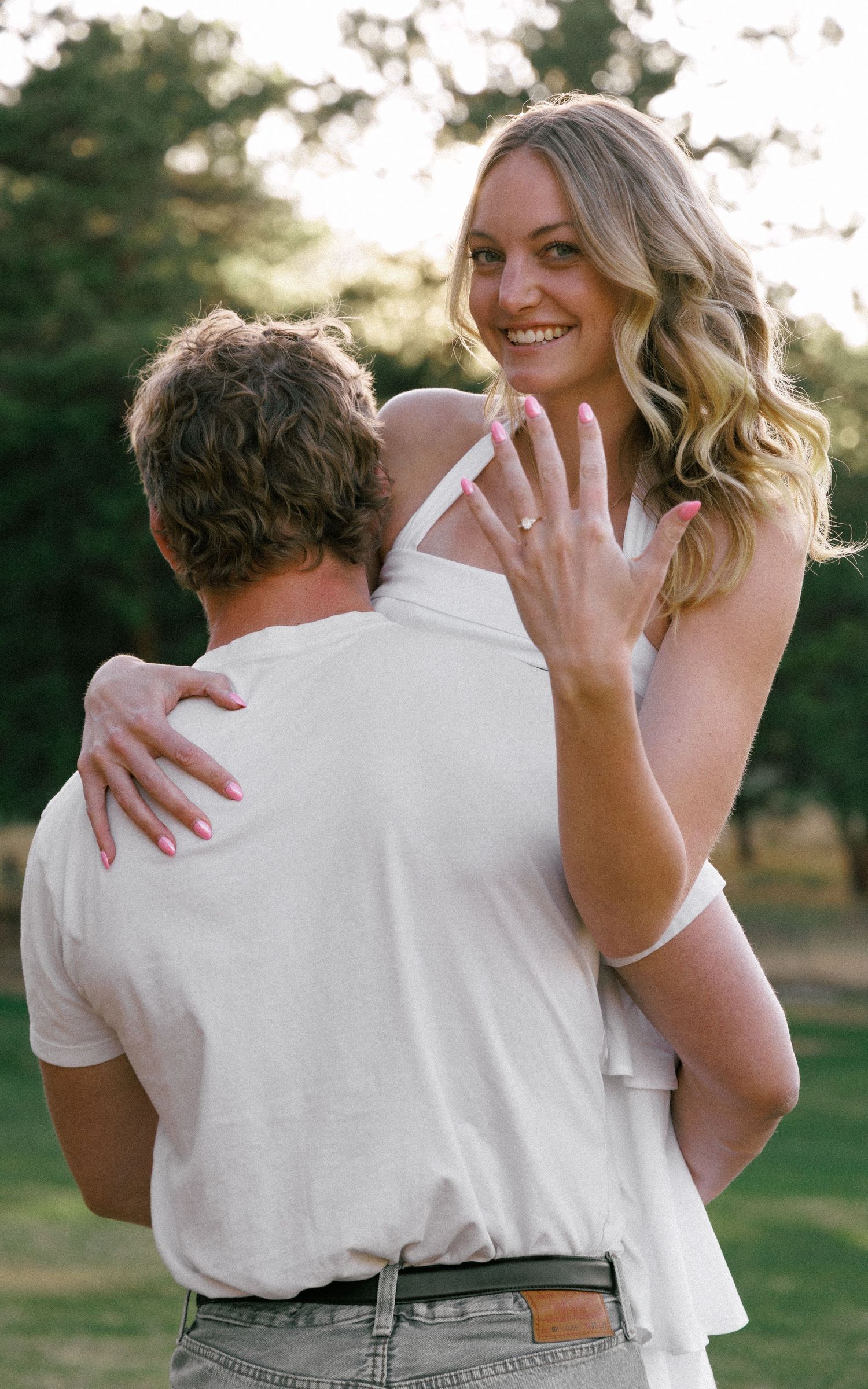 Evergreen Colorado engagement, over the shoulder ring shot