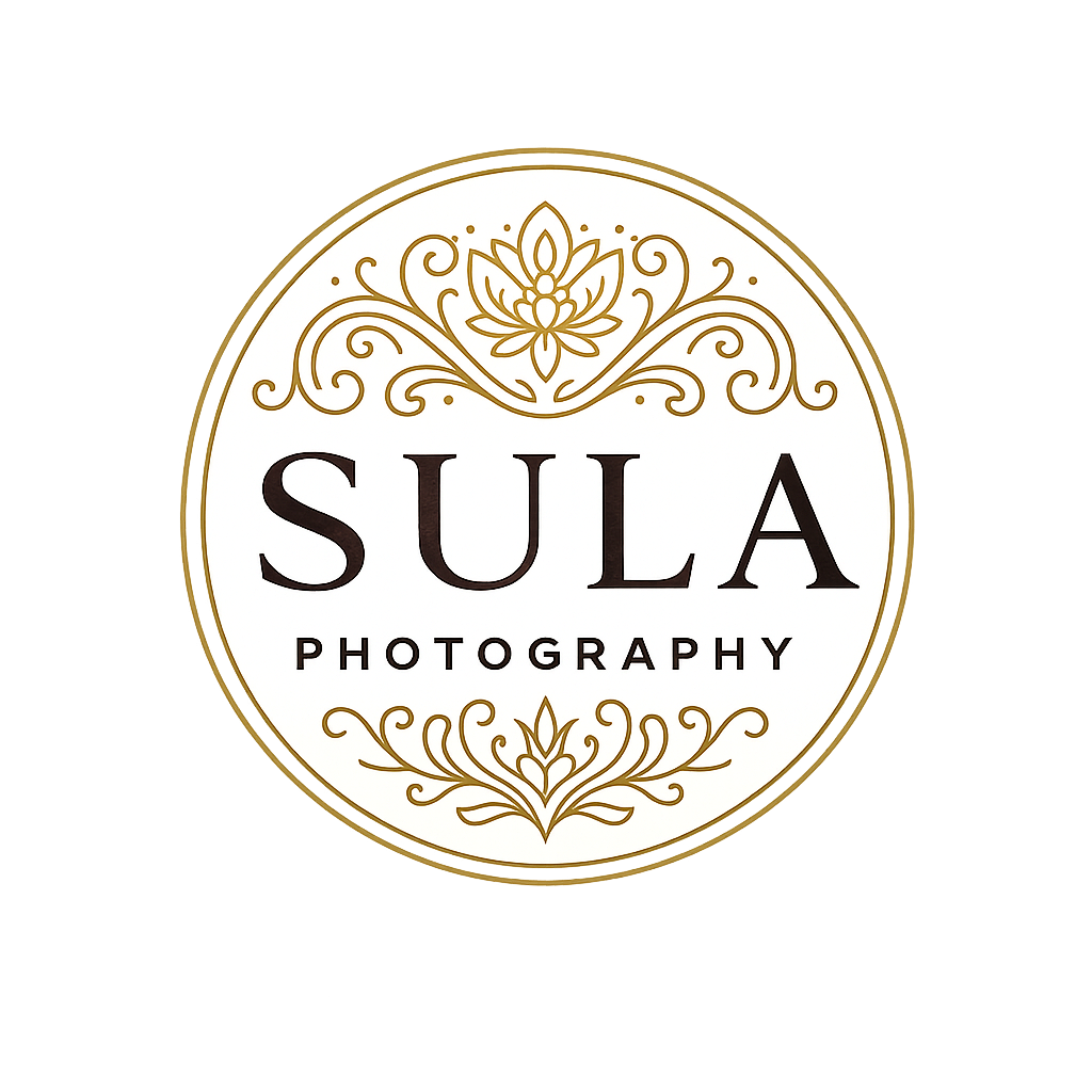 Elegant gold photography logo design with ornate decorative flourishes.