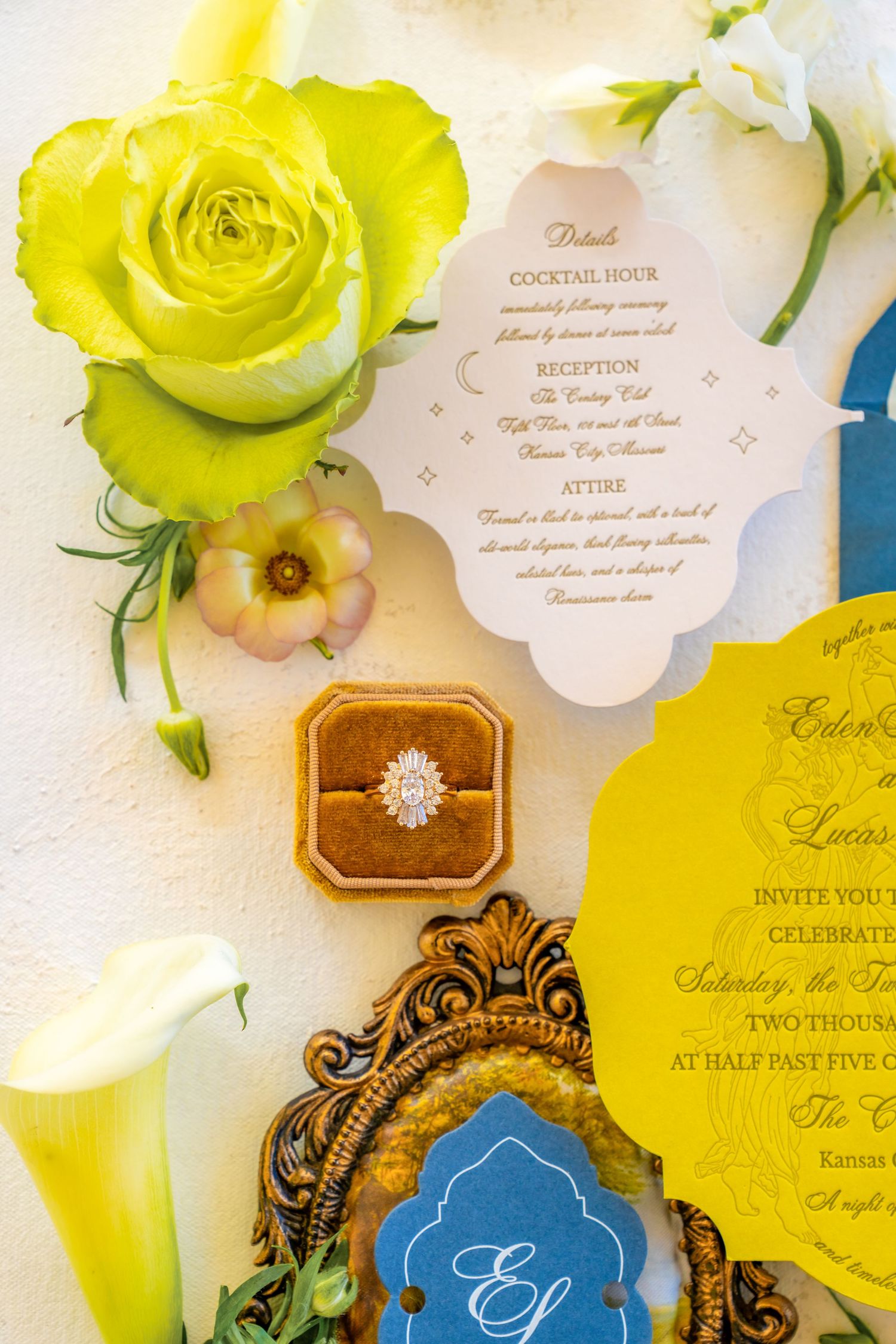 Wedding stationery details with yellow rose, cocktail menu, and vintage ring box.