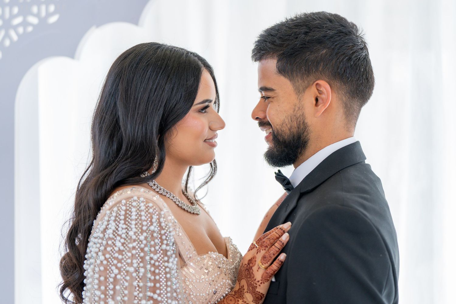Intimate wedding couple portraits showing romantic moments in formal attire.