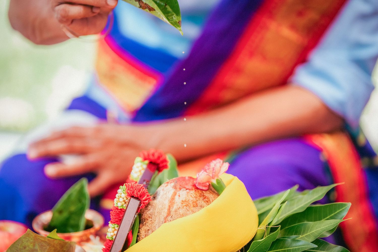 Colorful fruits and decorative items arranged for an Indian wedding ceremony.