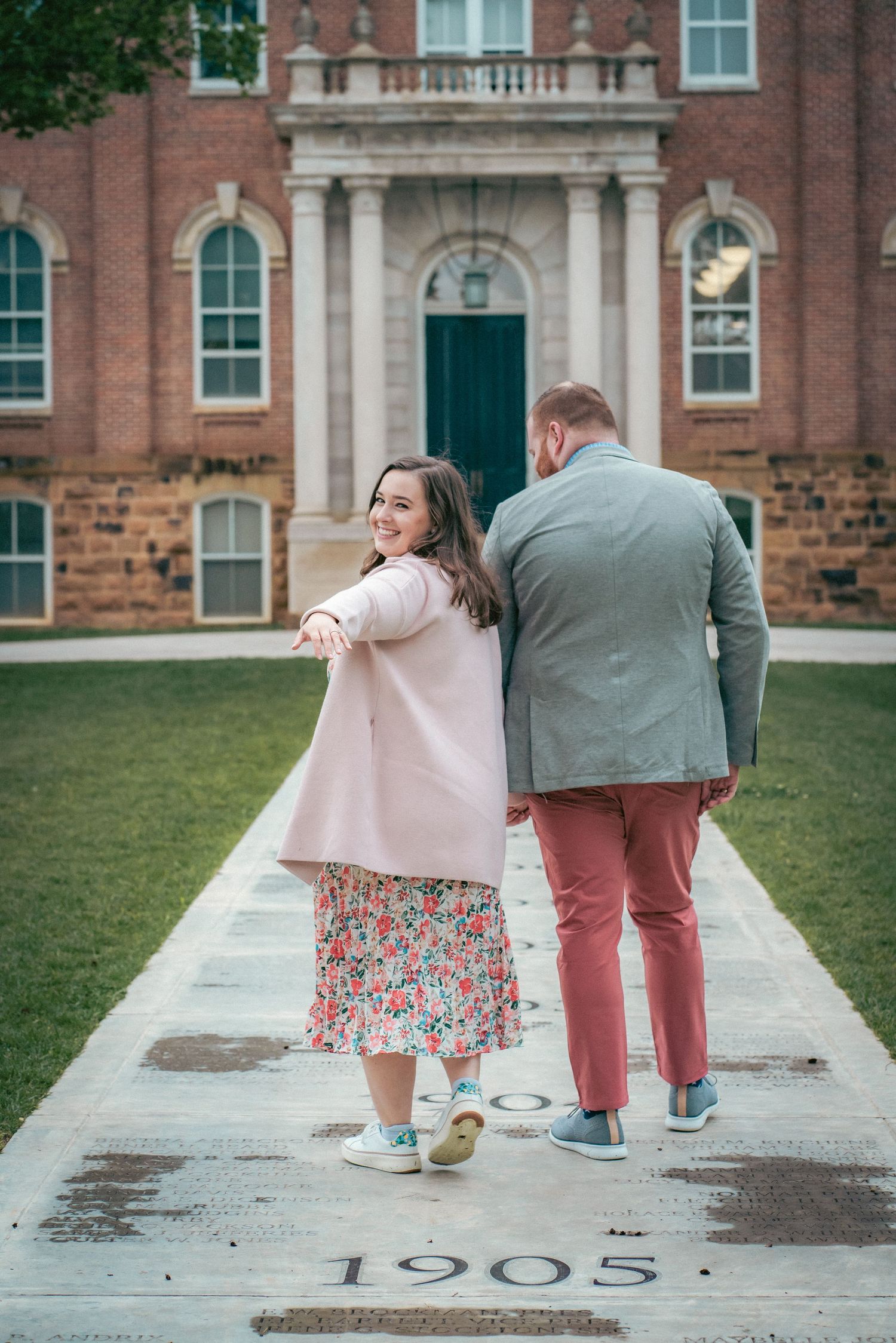 Couple walking on historic campus pathway marked with '1905' in a series of candid shots.