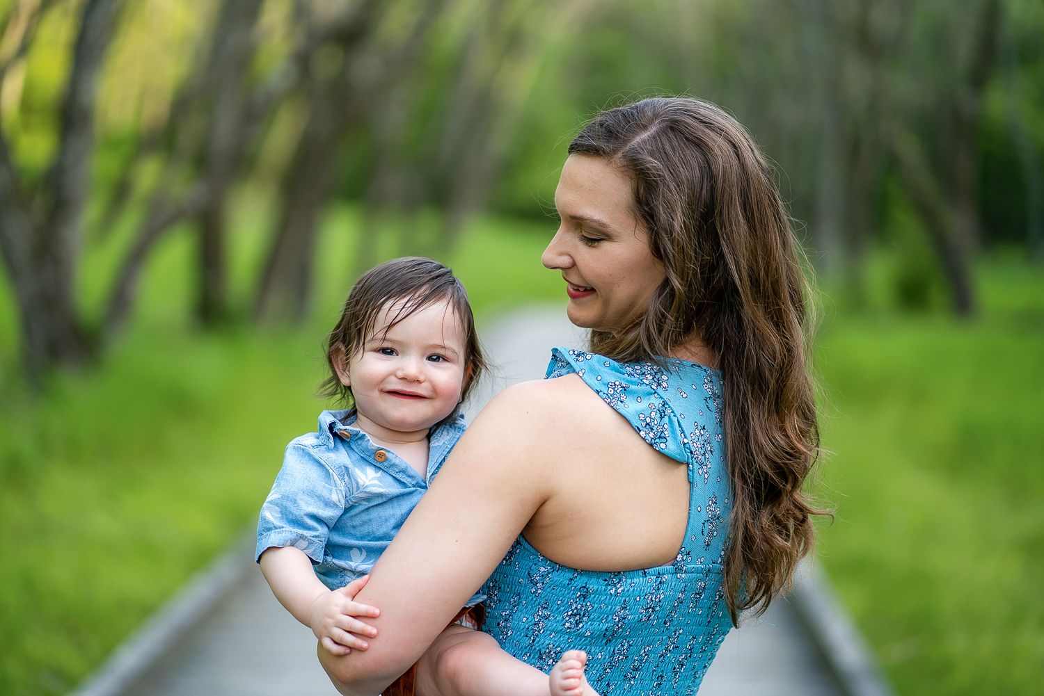 Mother and child portrait series showing joyful interactions in a natural outdoor setting.