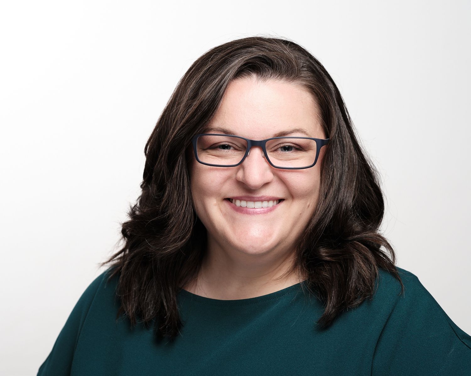 Headshot of Amber, captured in the studio