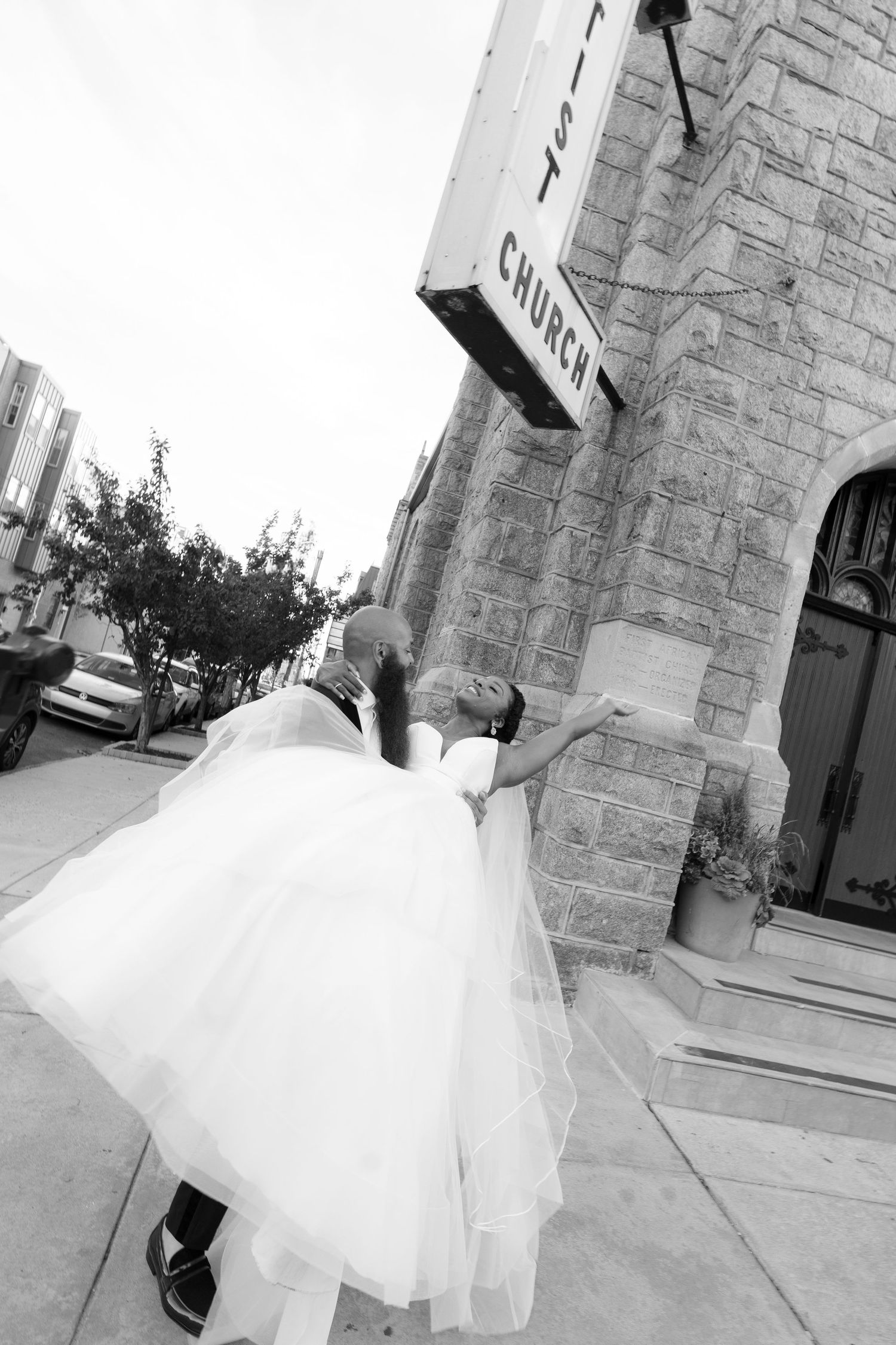 Flowing white wedding dress twirls in artistic black and white photo sequence.