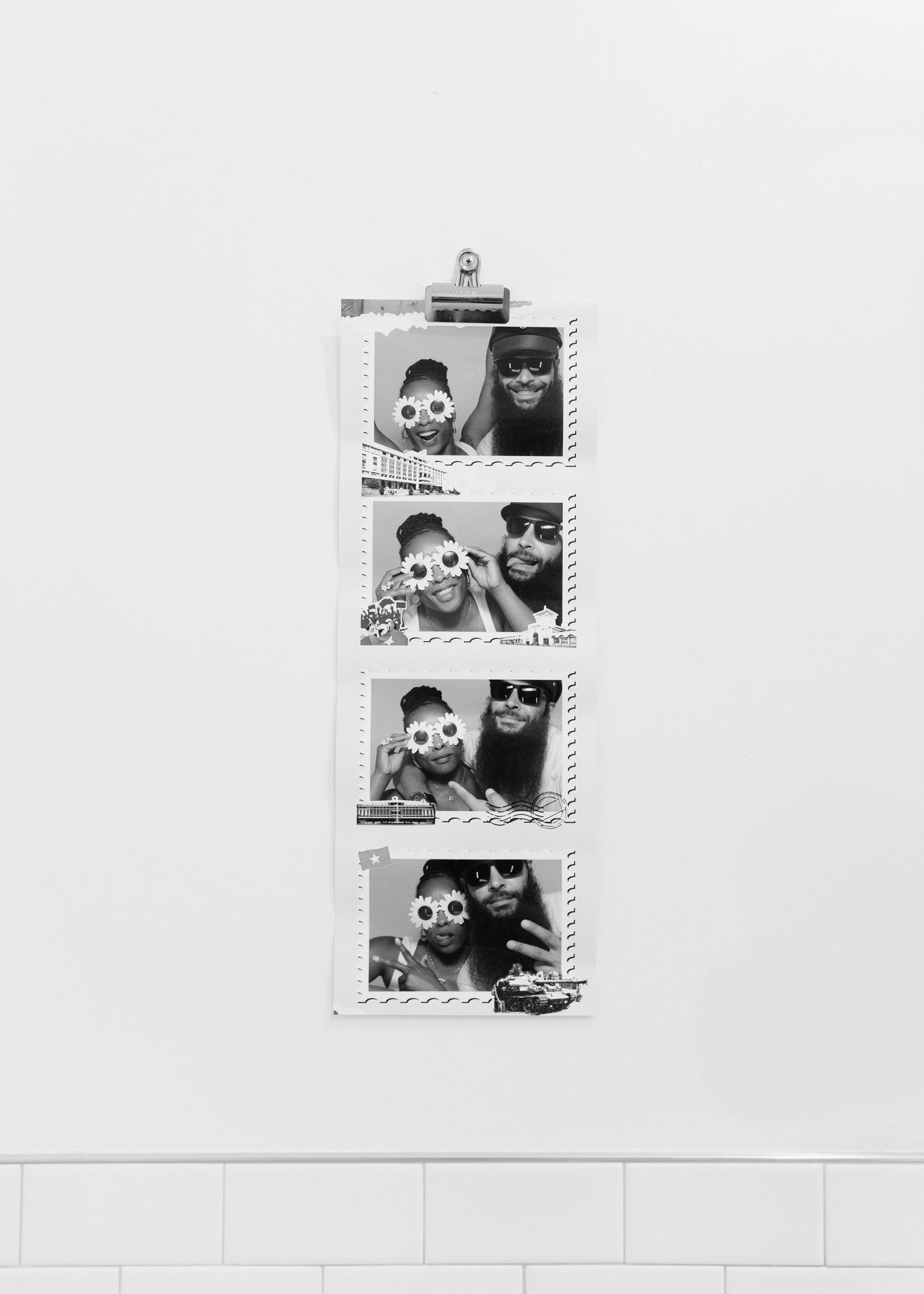 Black and white photo strip showing a sequence of playful poses.