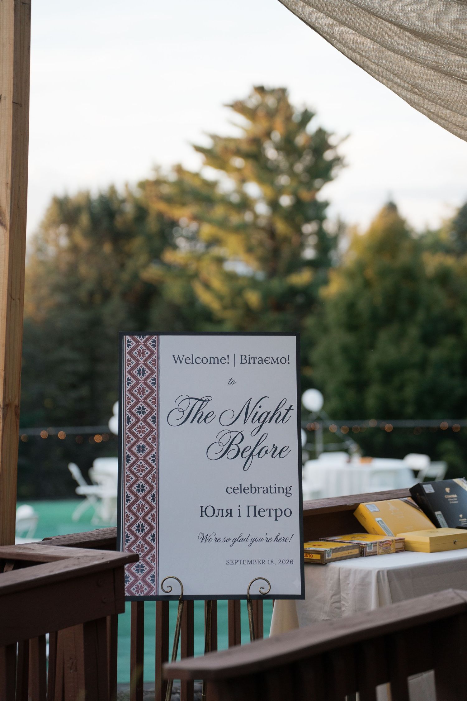 Elegant wedding welcome sign for The Night Before celebration, featuring Ukrainian text and decorative border design.
