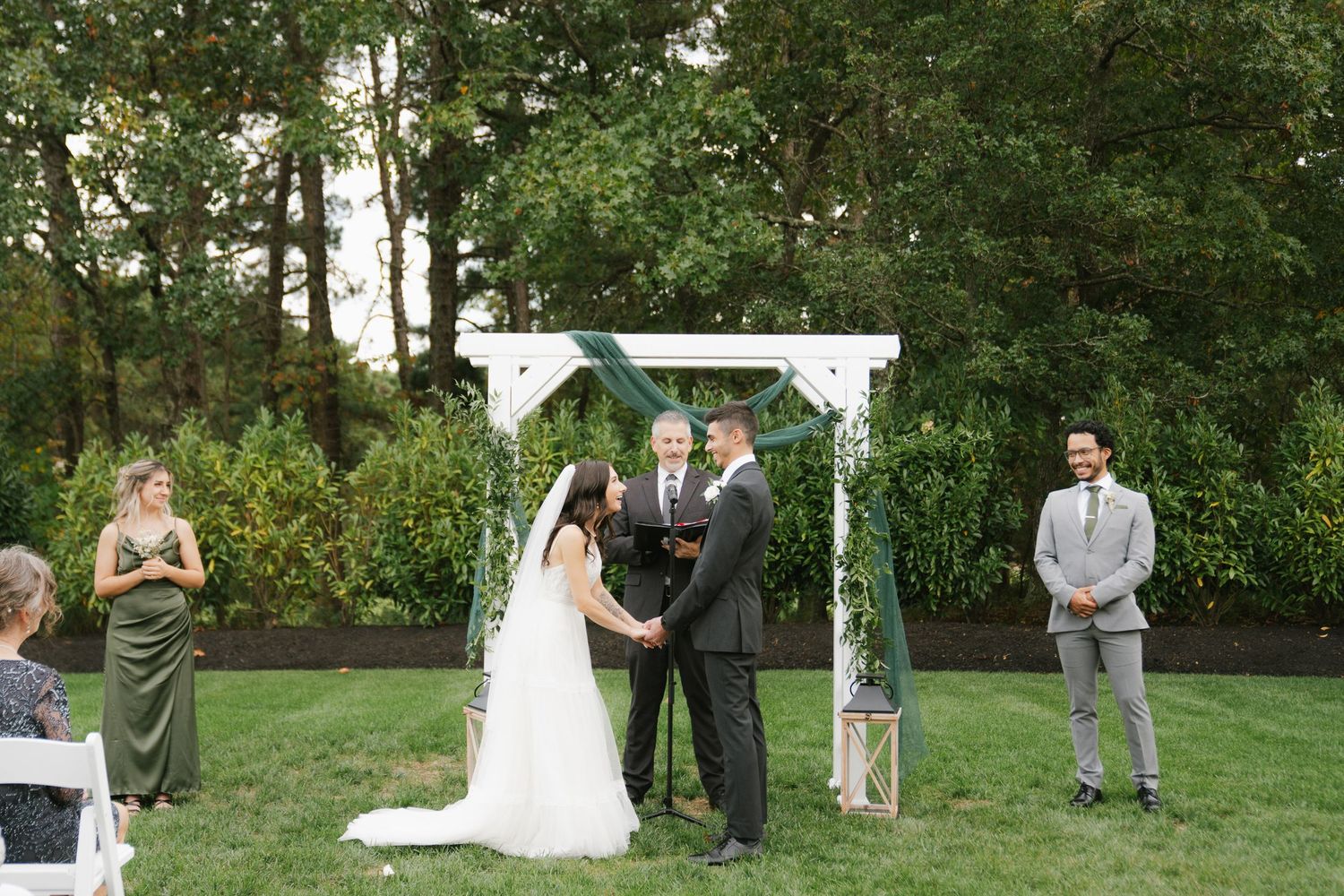 A series of outdoor wedding ceremony photos showing a couple getting married in a lush green garden setting.