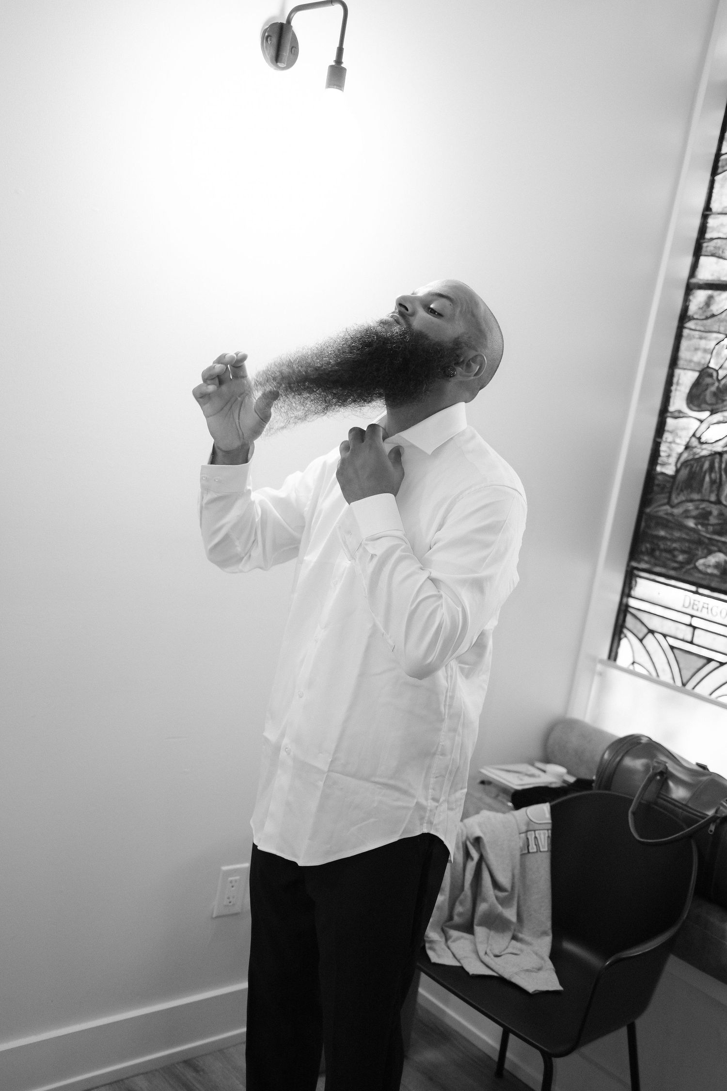 Series of expressive moments captured in black and white against a white wall.