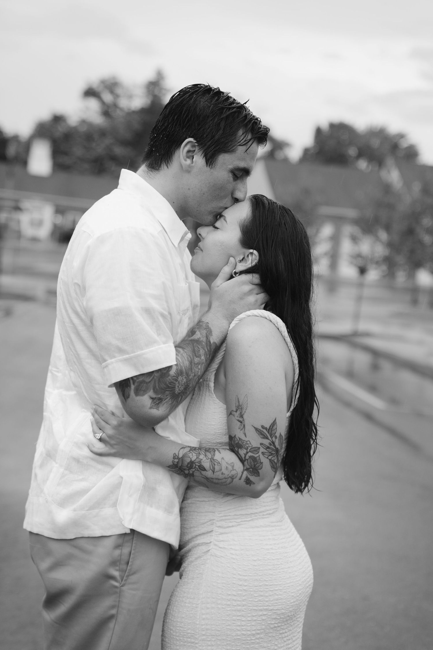 Romantic black and white sequence of couple sharing tender moments outdoors.