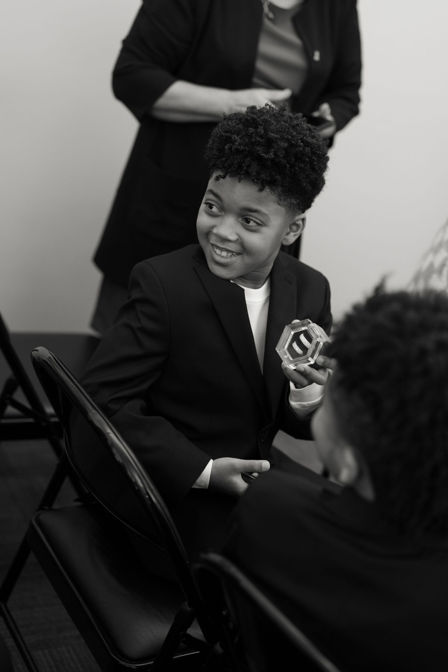 Black and white photos of joyful moments during a celebration.