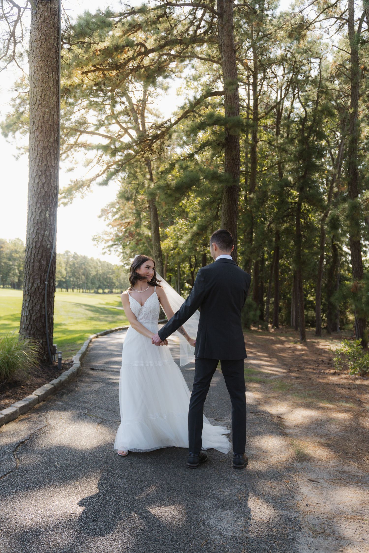 A romantic wedding photo sequence showing a couple dancing together in a sunlit pine forest setting.