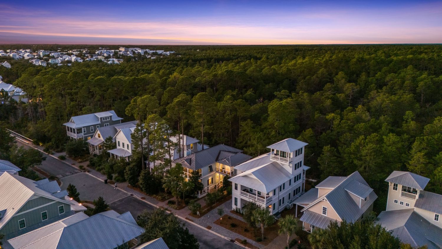Aerial twilight view of 30A neighborhood near Gulf Coast, captured by Coast Captured Drone Photography for real estate listings