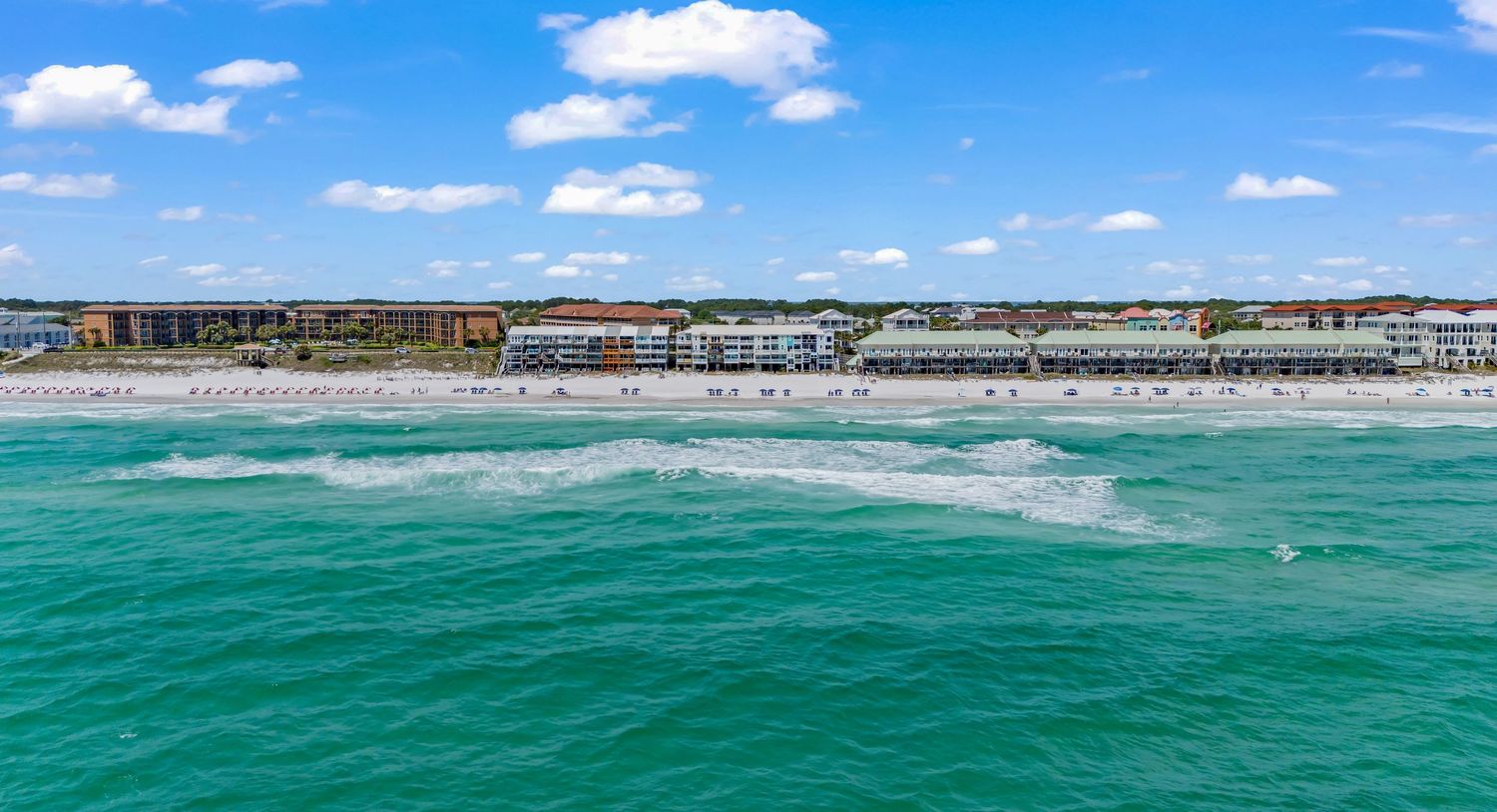 Drone aerial of Emerald Coast shoreline and Gulf of Mexico waters, captured by Coast Captured 30A Real Estate Photography