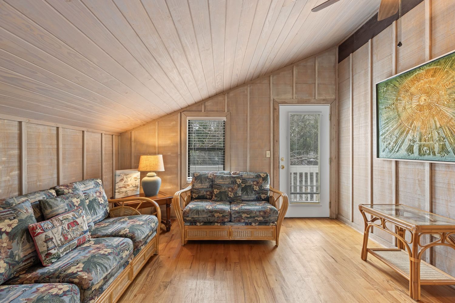 Warm living room with natural light and coastal décor, professional interior photography for Florida home listings by Coast Captured