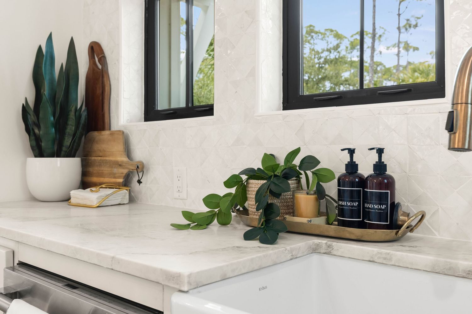 Bathroom vanity with natural décor and greenery, lifestyle interior detail captured by Coast Captured for Emerald Coast listings