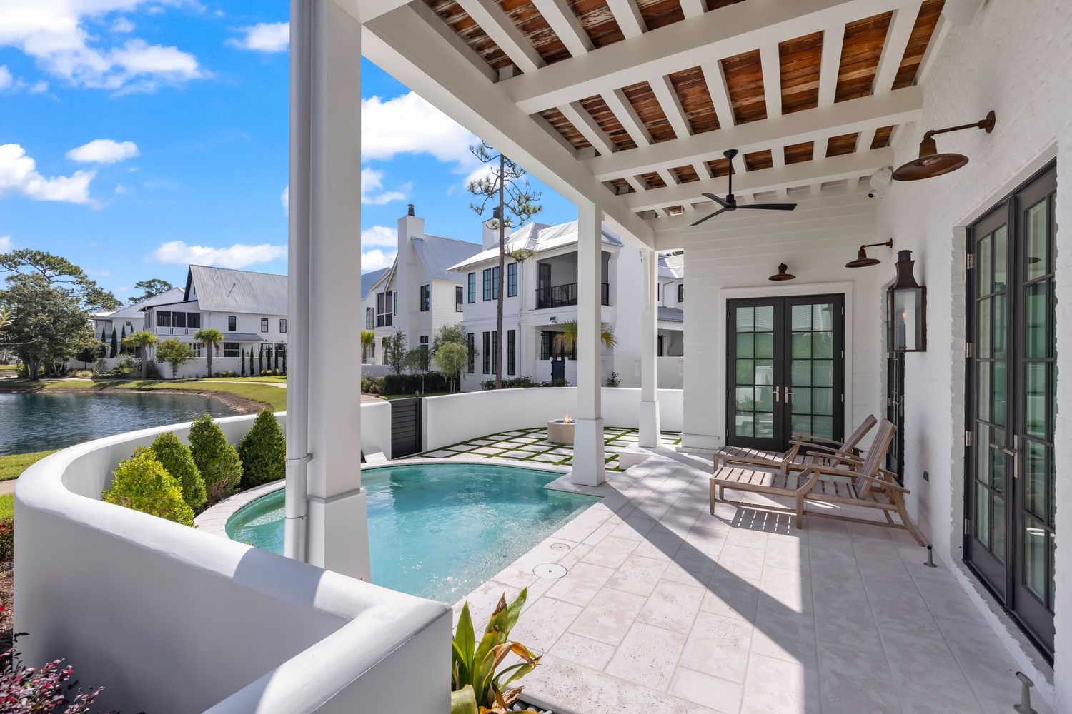 Luxury coastal home with private pool and covered patio in Santa Rosa Beach, photographed by Coast Captured Real Estate Photography