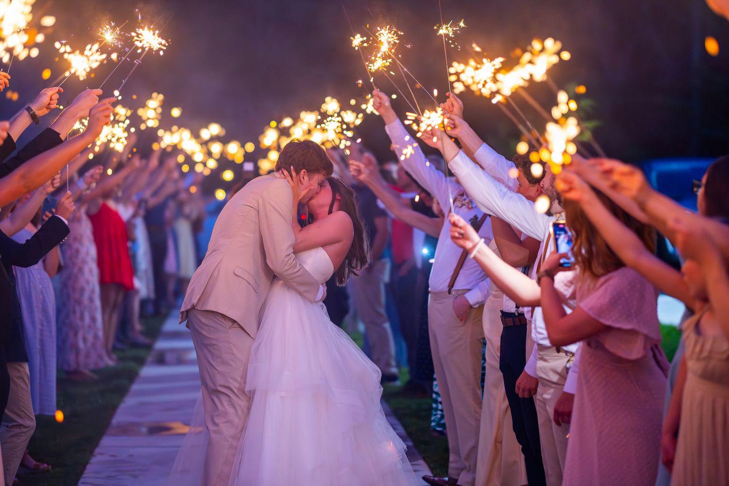 couple kiss at send-off