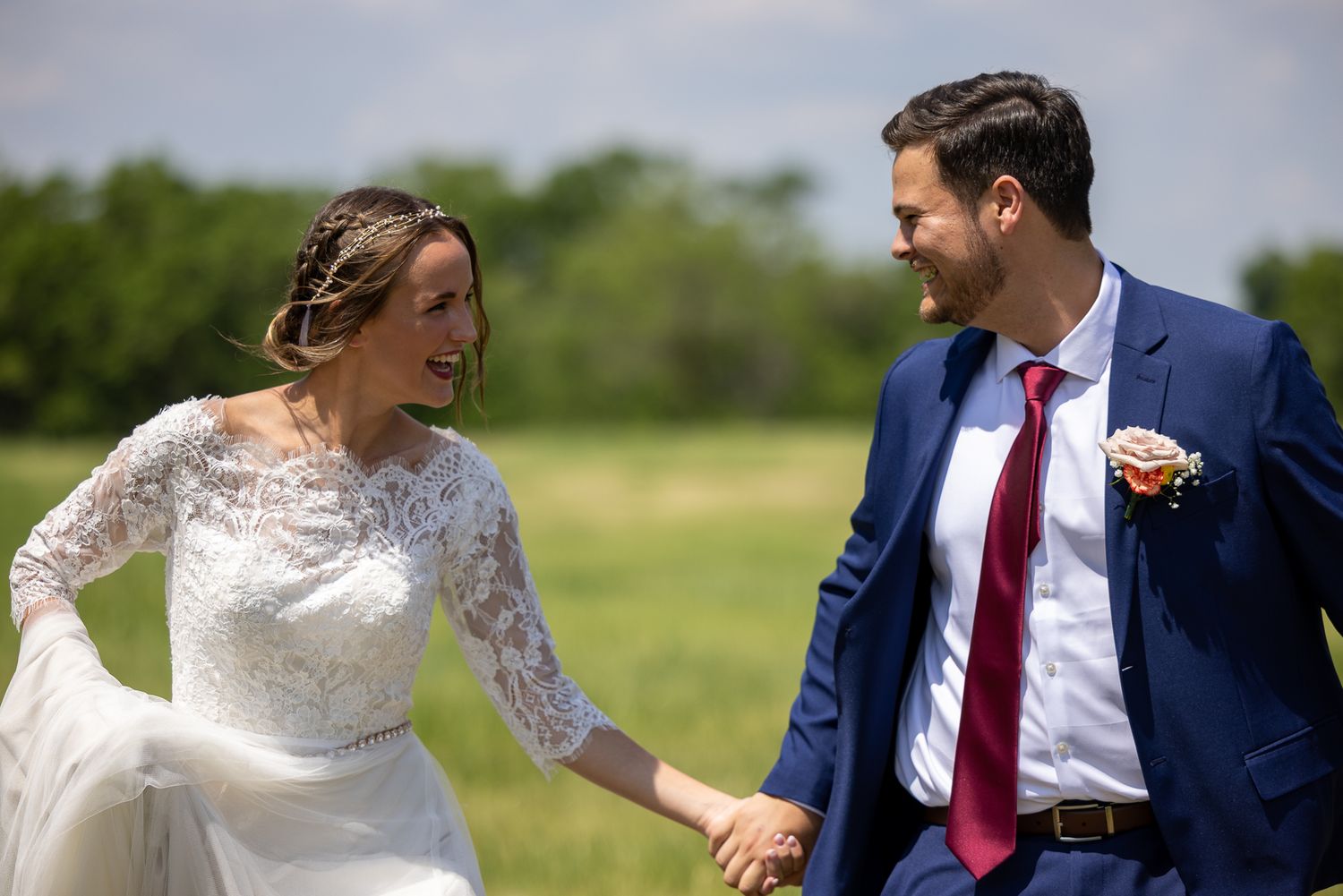 wedding couple running