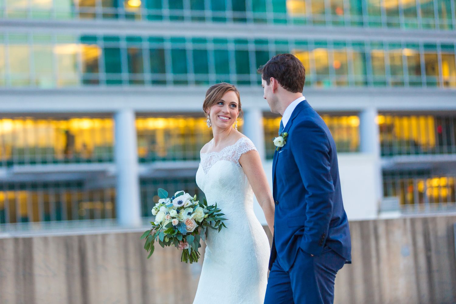 bride and groom in city