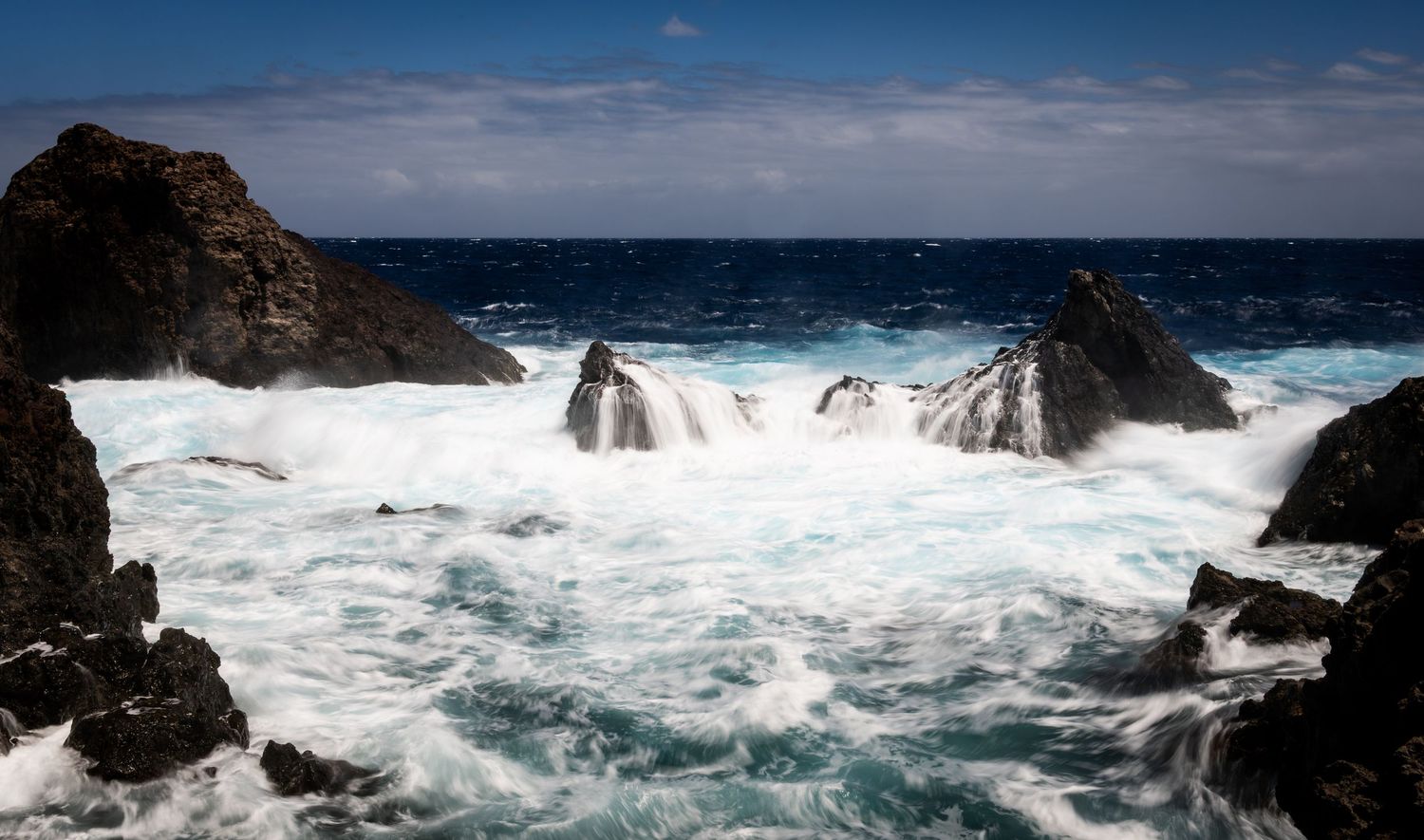 Dramatic nature scene in beautiful colours where sky meets sea