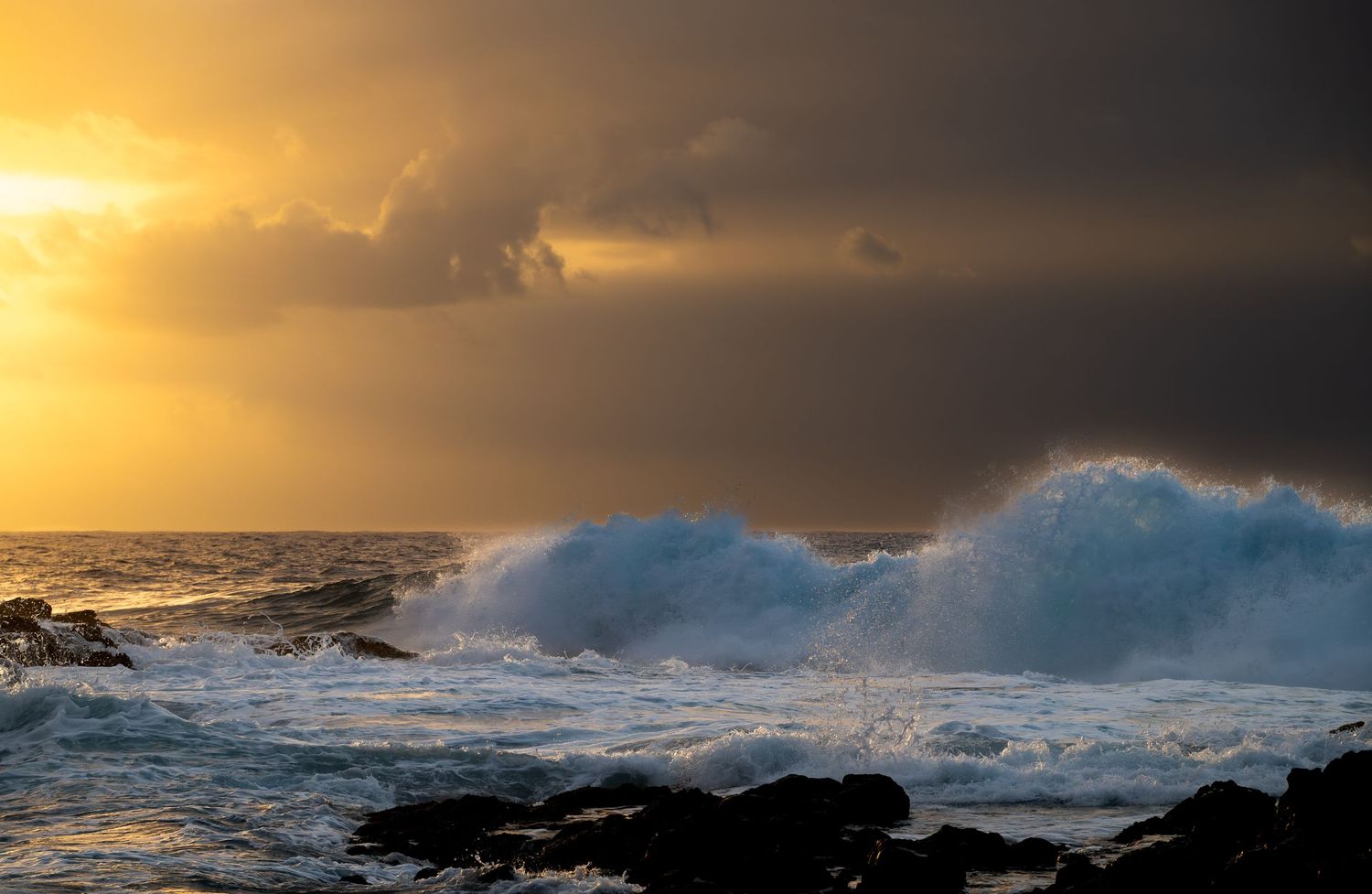 Dramatic nature scene in beautiful colours where sunset meets sea
