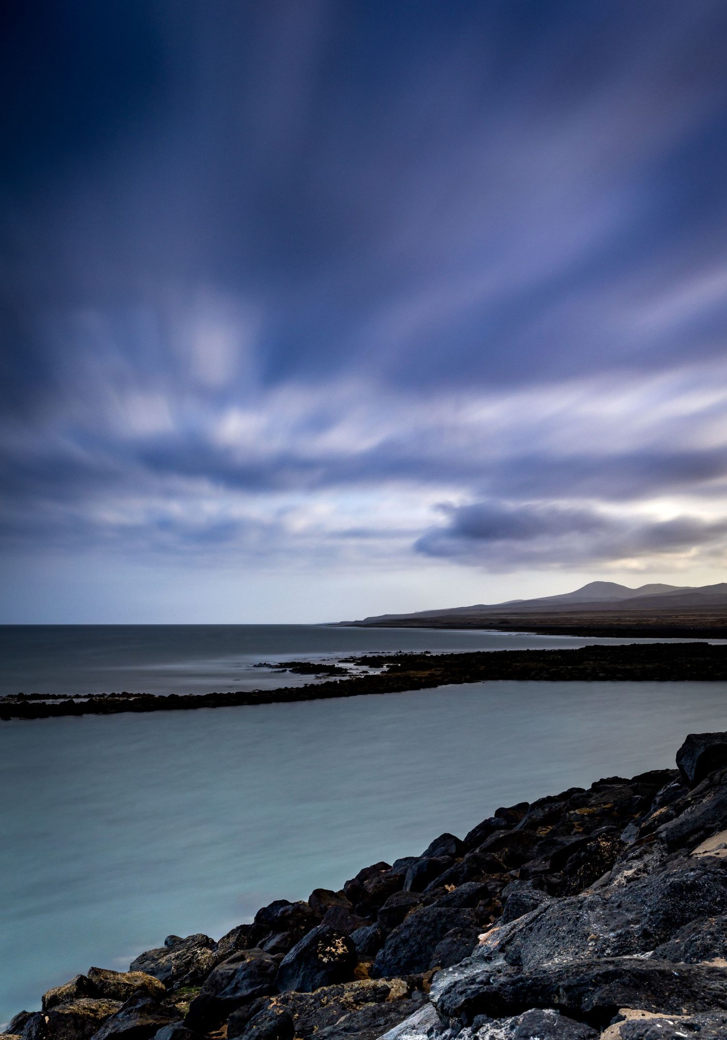 Dramatic nature scene in beautiful colours where sky meets sea