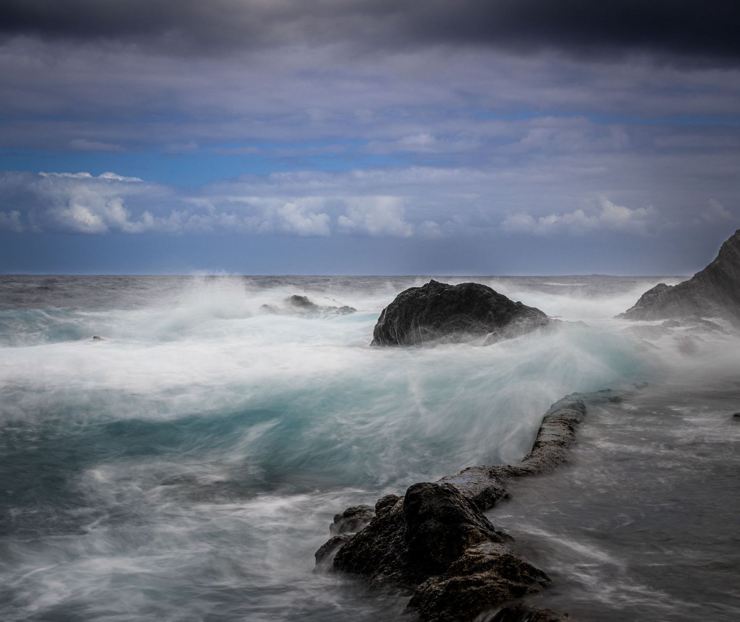 Dramatic nature scene in beautiful colours where sky meets sea