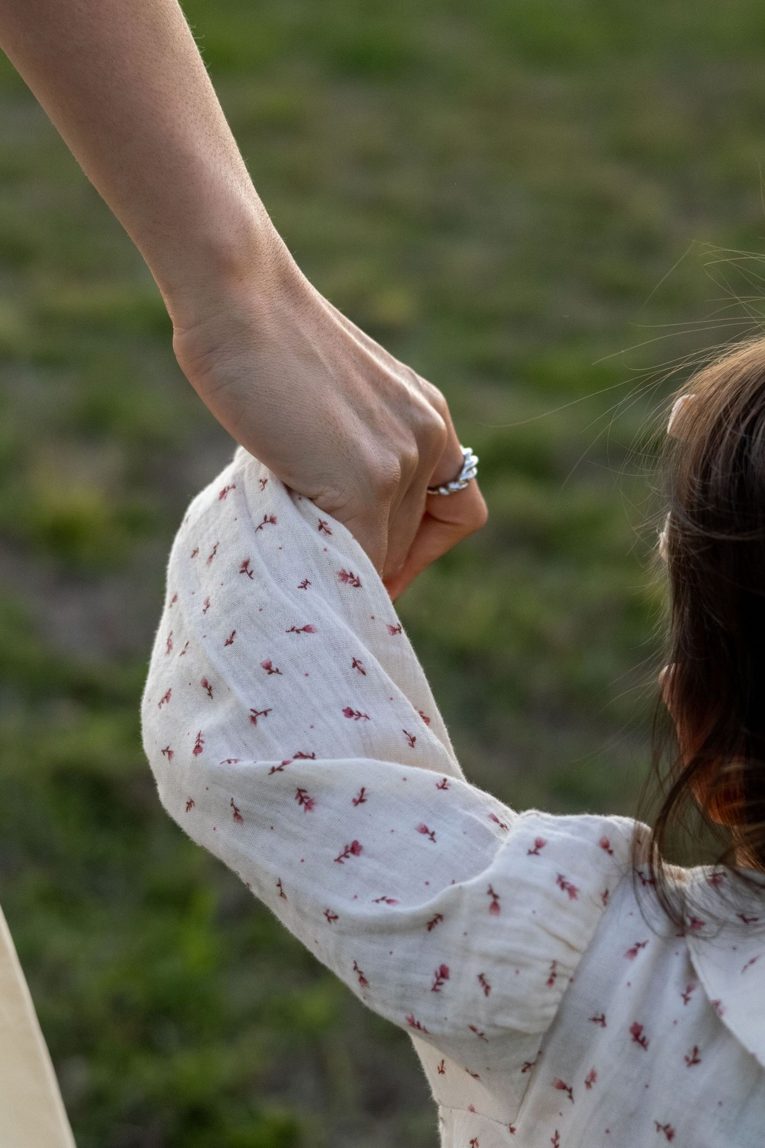 Little perth girl holding mums hand